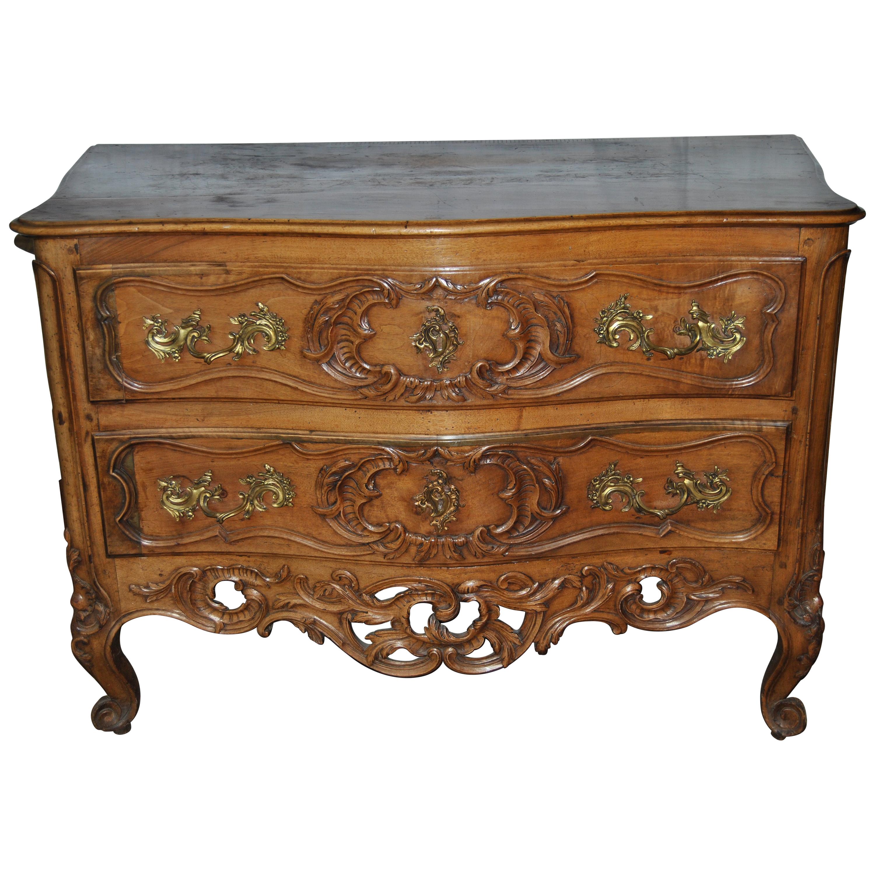 18th Century French Carved Walnut Chest of Drawers For Sale