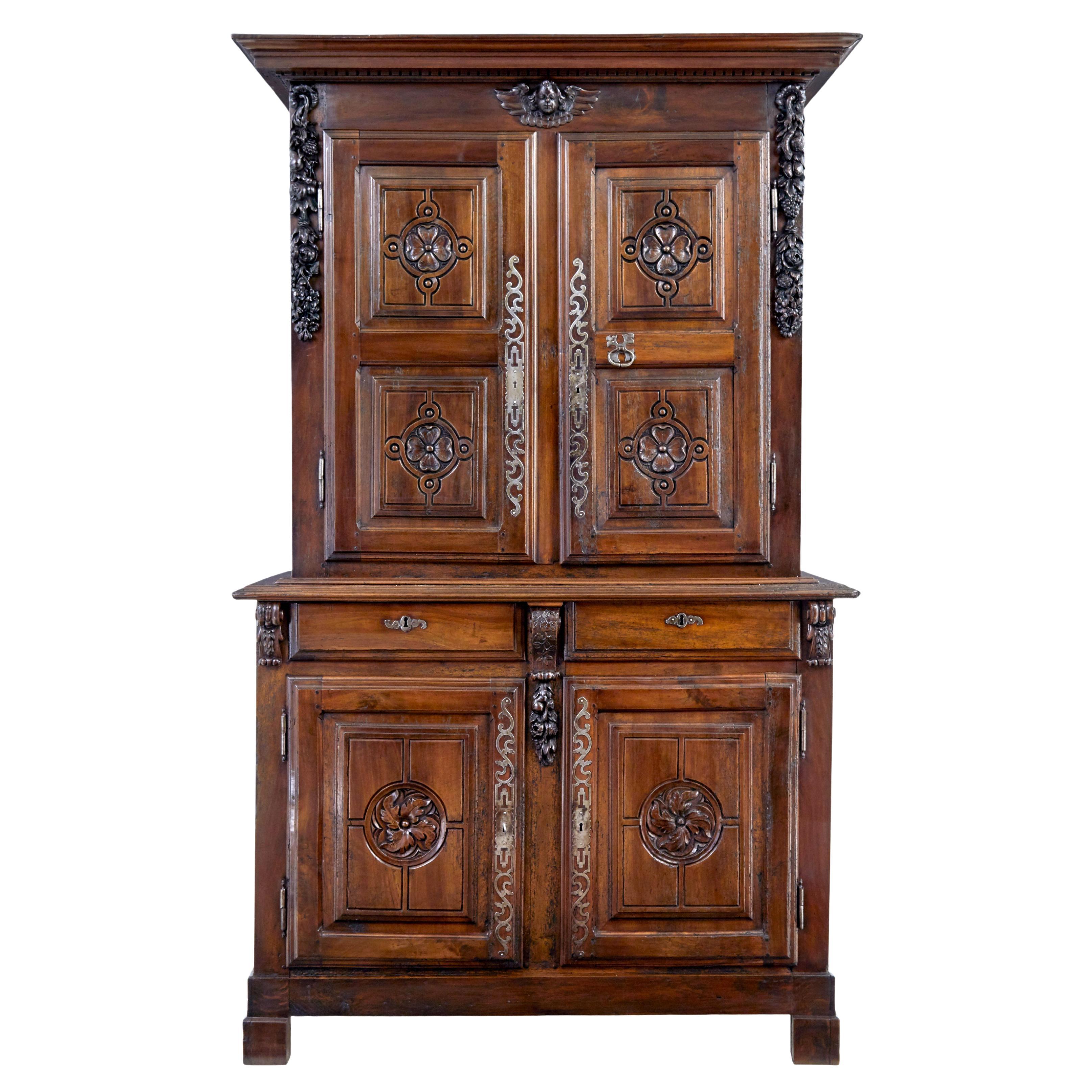 18th century French carved walnut cupboard