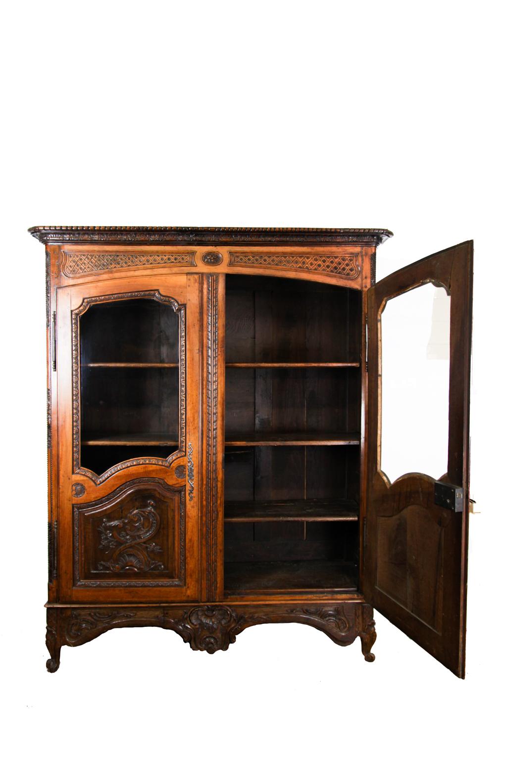 Hand-Carved 18th Century French Carved Walnut Glass Door Cupboard For Sale