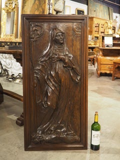18th Century French Carved Walnut Panel of Saint Radegonde and The Grand’Goule