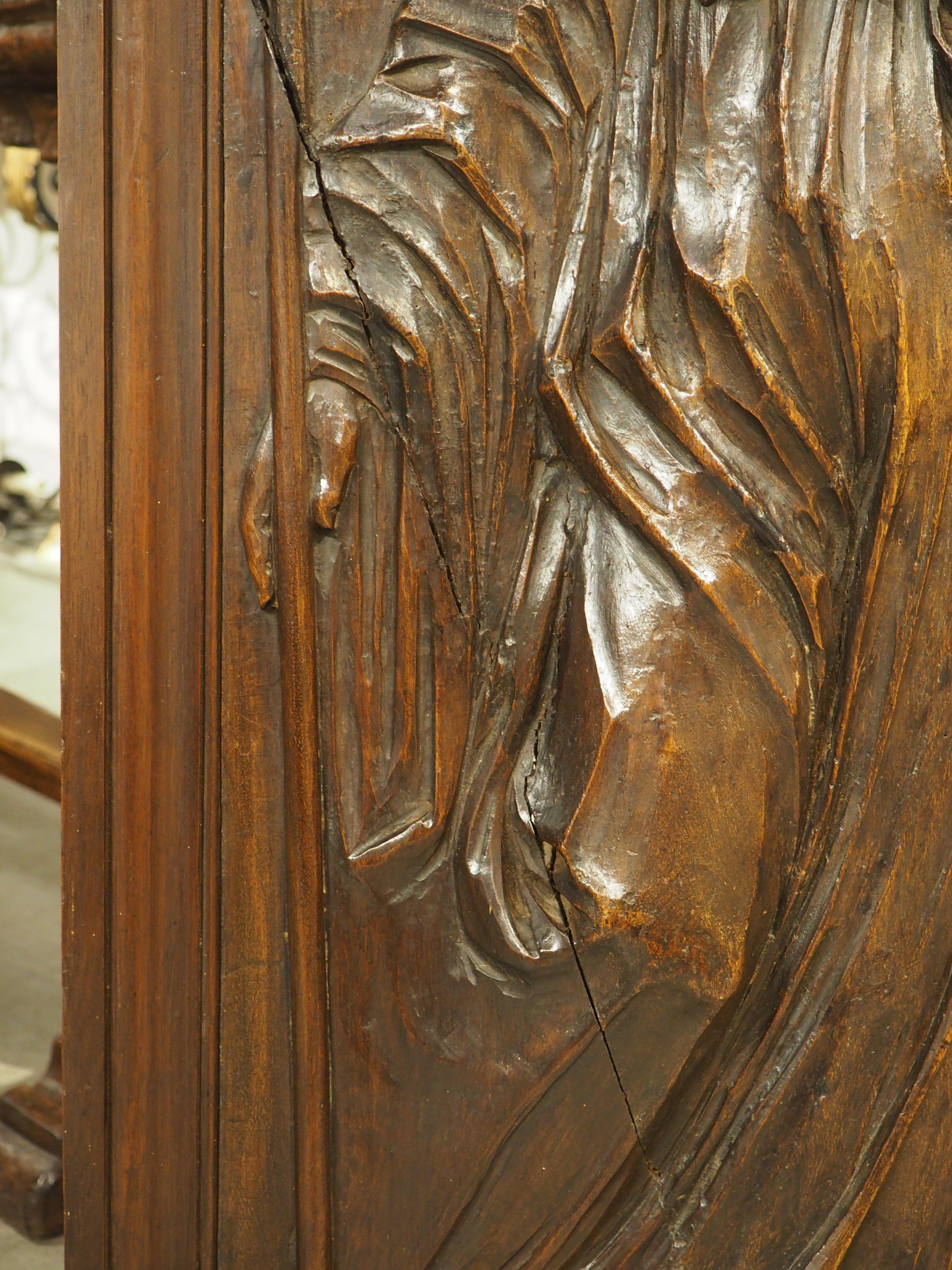 18th Century and Earlier 18th Century French Carved Walnut Panel of Saint Radegonde and The Grand’Goule For Sale