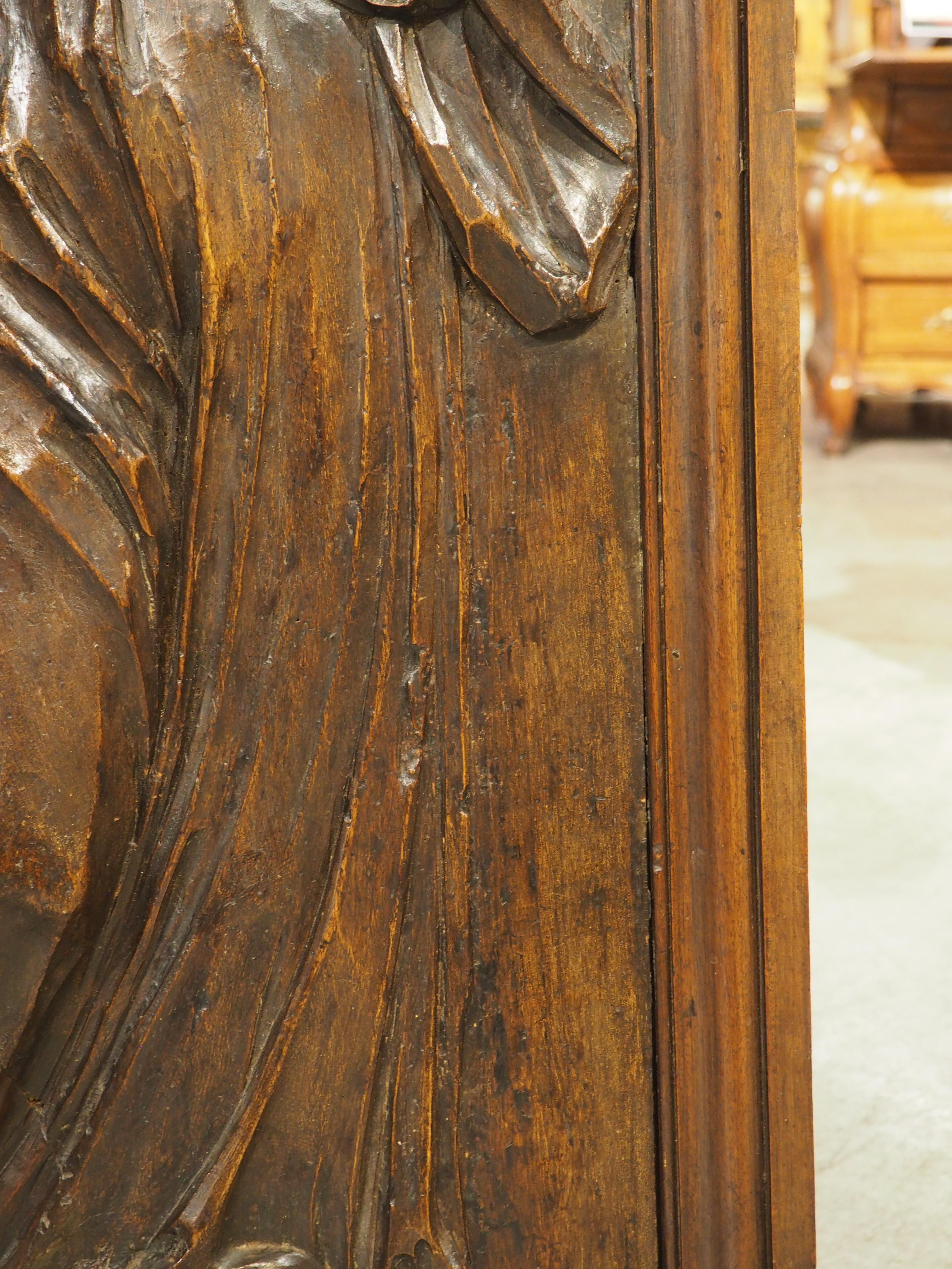 Wood 18th Century French Carved Walnut Panel of Saint Radegonde and The Grand’Goule For Sale