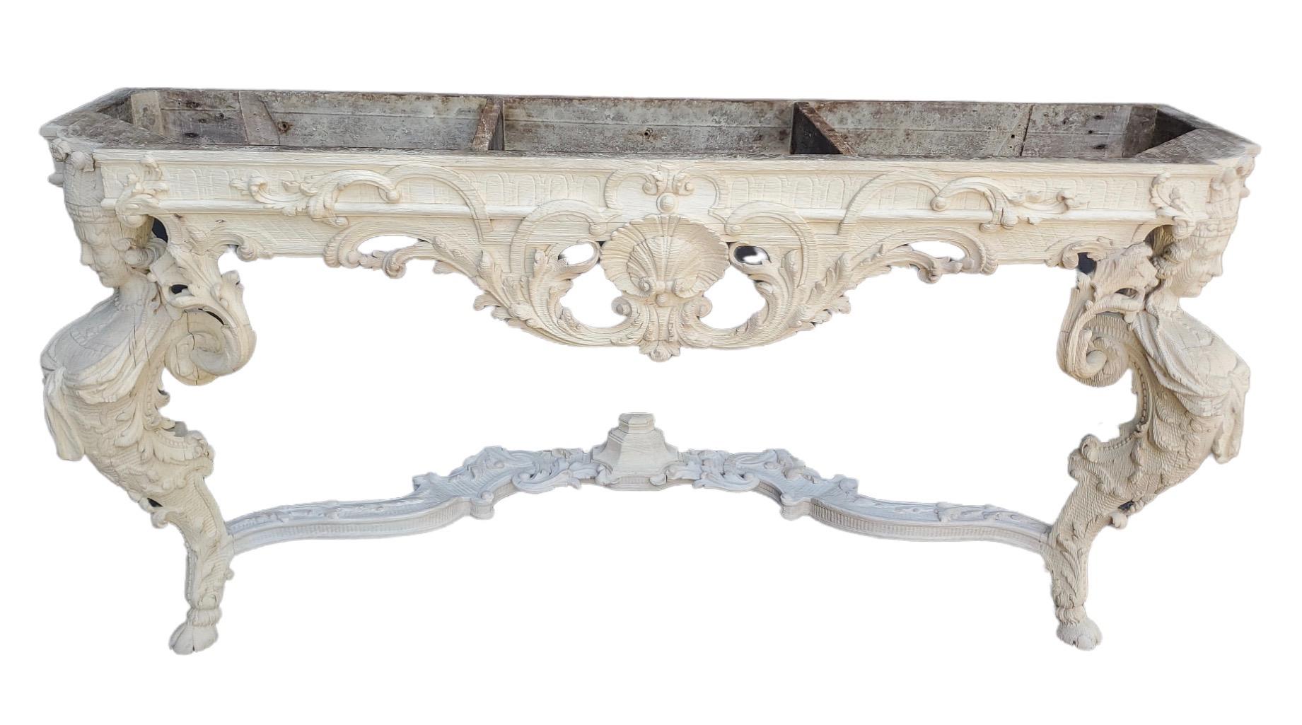 Carved oak that has been lymed to white. Rock crystal tops.
