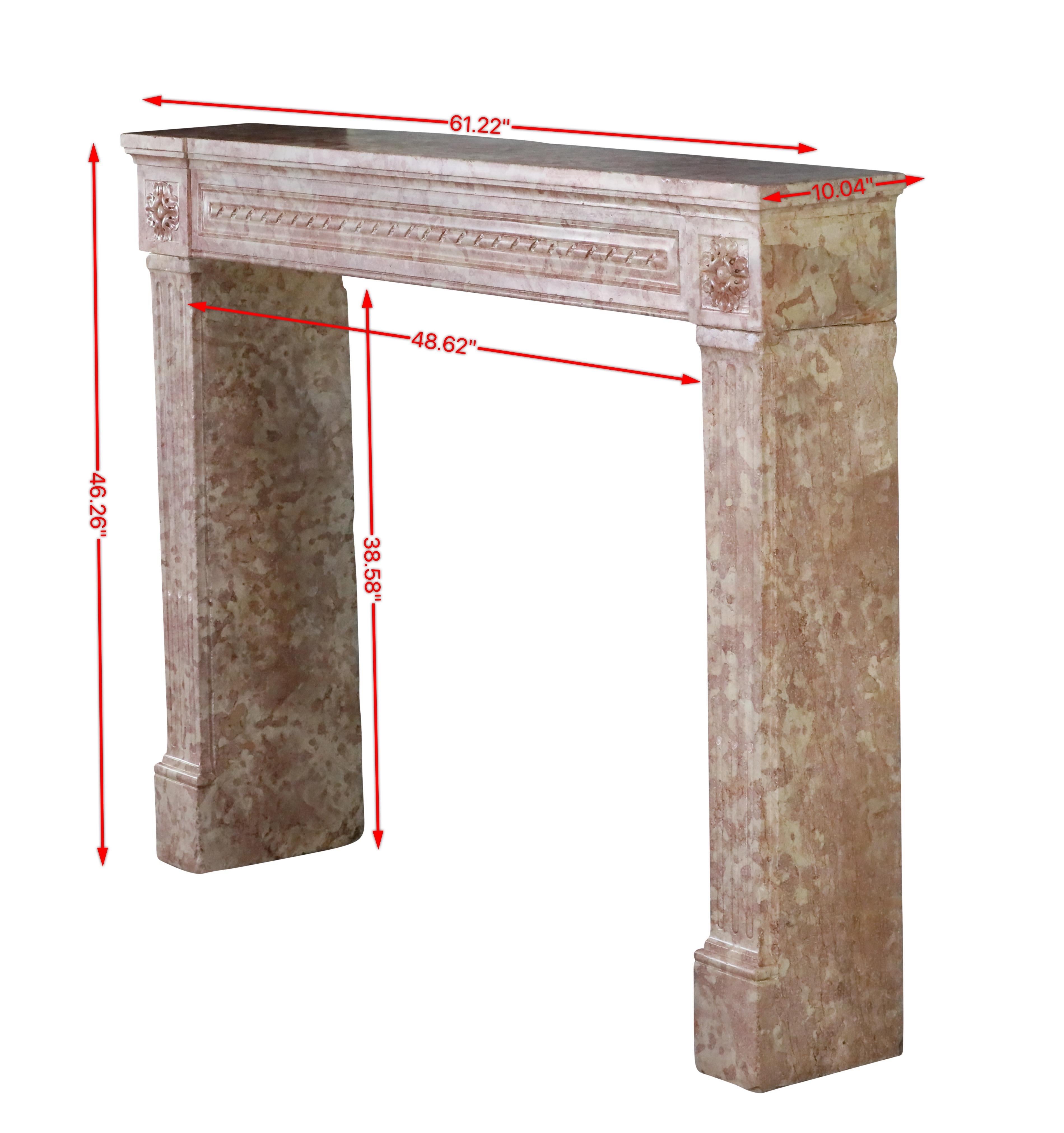 French 18th century period castle fireplace surround in Burgundian hard-stone. The rose and ivory marble stone was only used for high-end interior design.
LXVI period fireplace mantle for timeless chic interiors.
Measurements:
155,5 cm Exterior