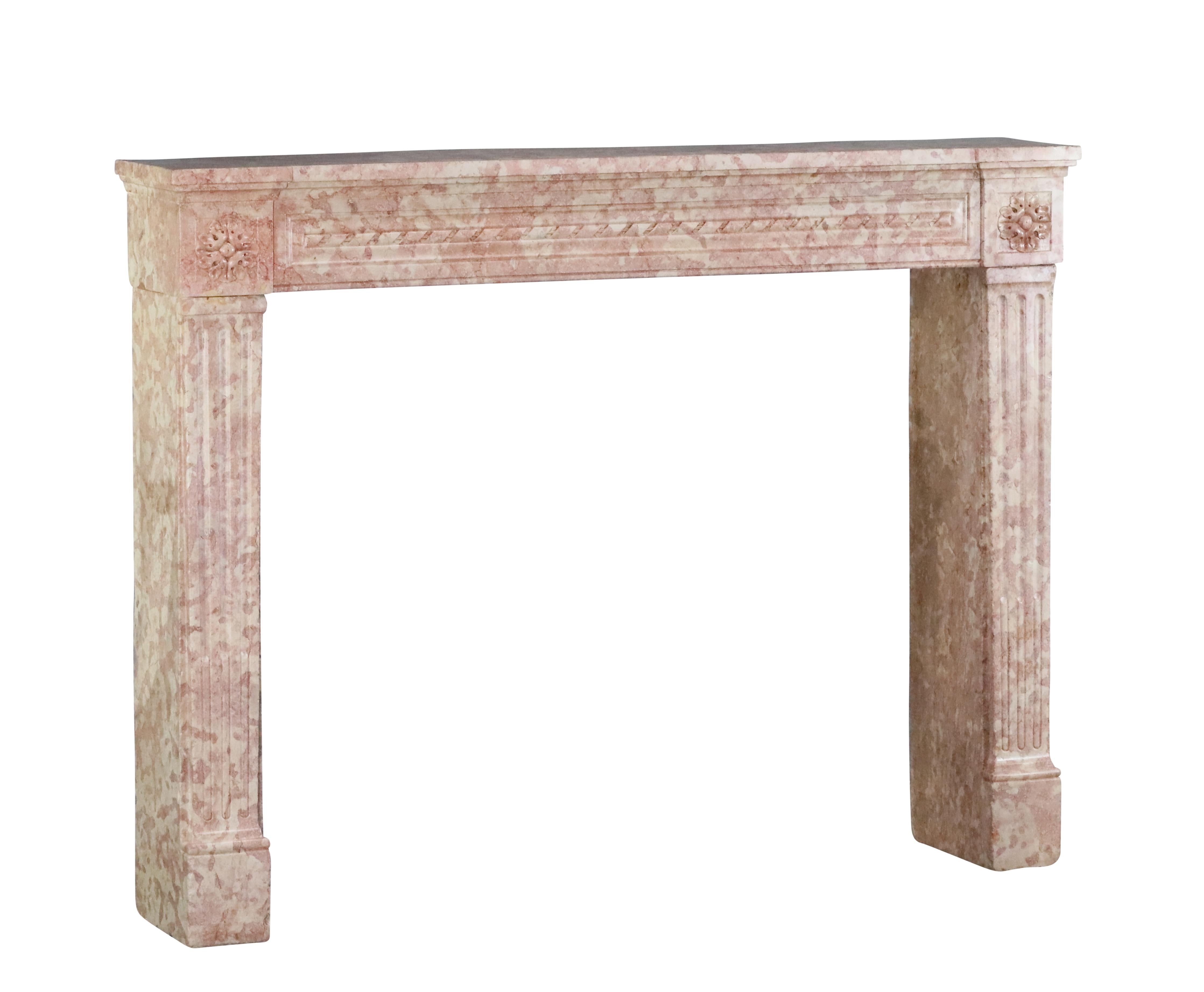 Hand-Carved 18th Century French Castle Fireplace In Rose And Ivory Marble Stone For Sale