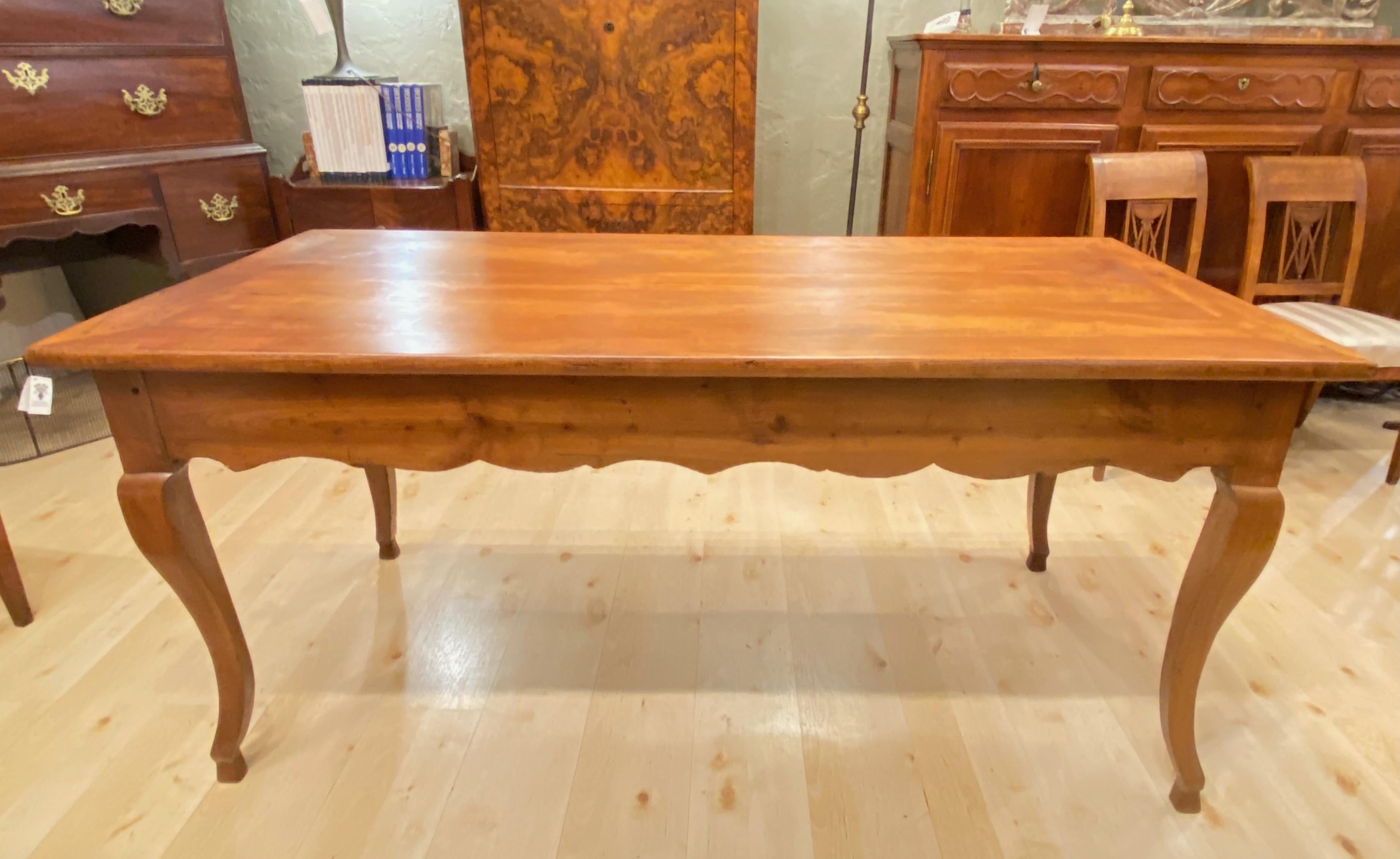 18th Century solid cherrywood dining table. In remarkable antique condition. Beautifully crafted French County style. Having a useful cutlery drawer on each end.
Acquired from a private Hillsborough estate.
Measurement of height from the floor to