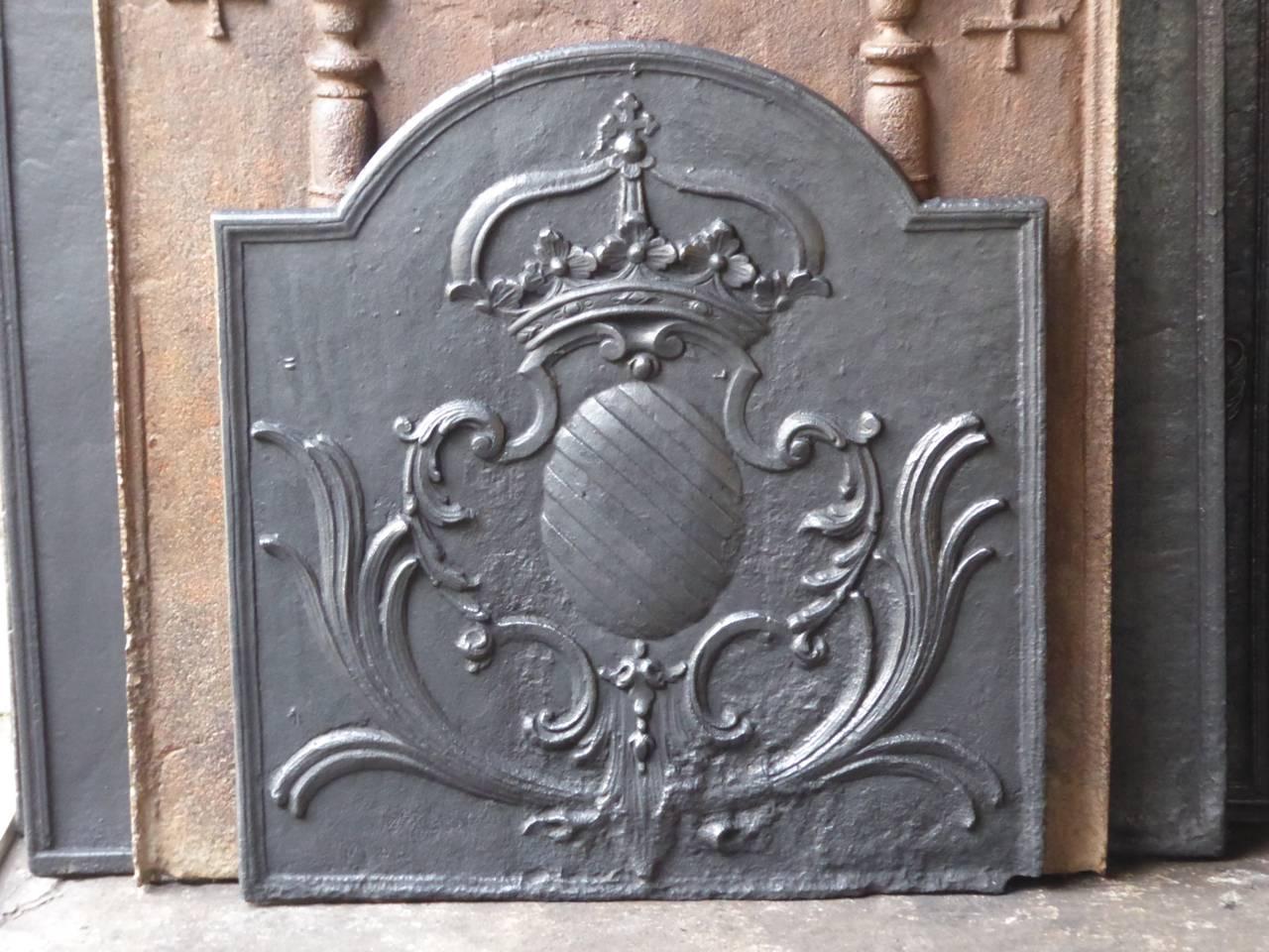 18th century French fireplace fireback with a coat of arms.

We have a unique and specialized collection of antique and used fireplace accessories consisting of more than 1000 listings at 1stdibs. Amongst others, we always have 300+ firebacks, 250+