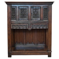 18th century French Colonial Cabinet In Patinated Oak With Gothic elements