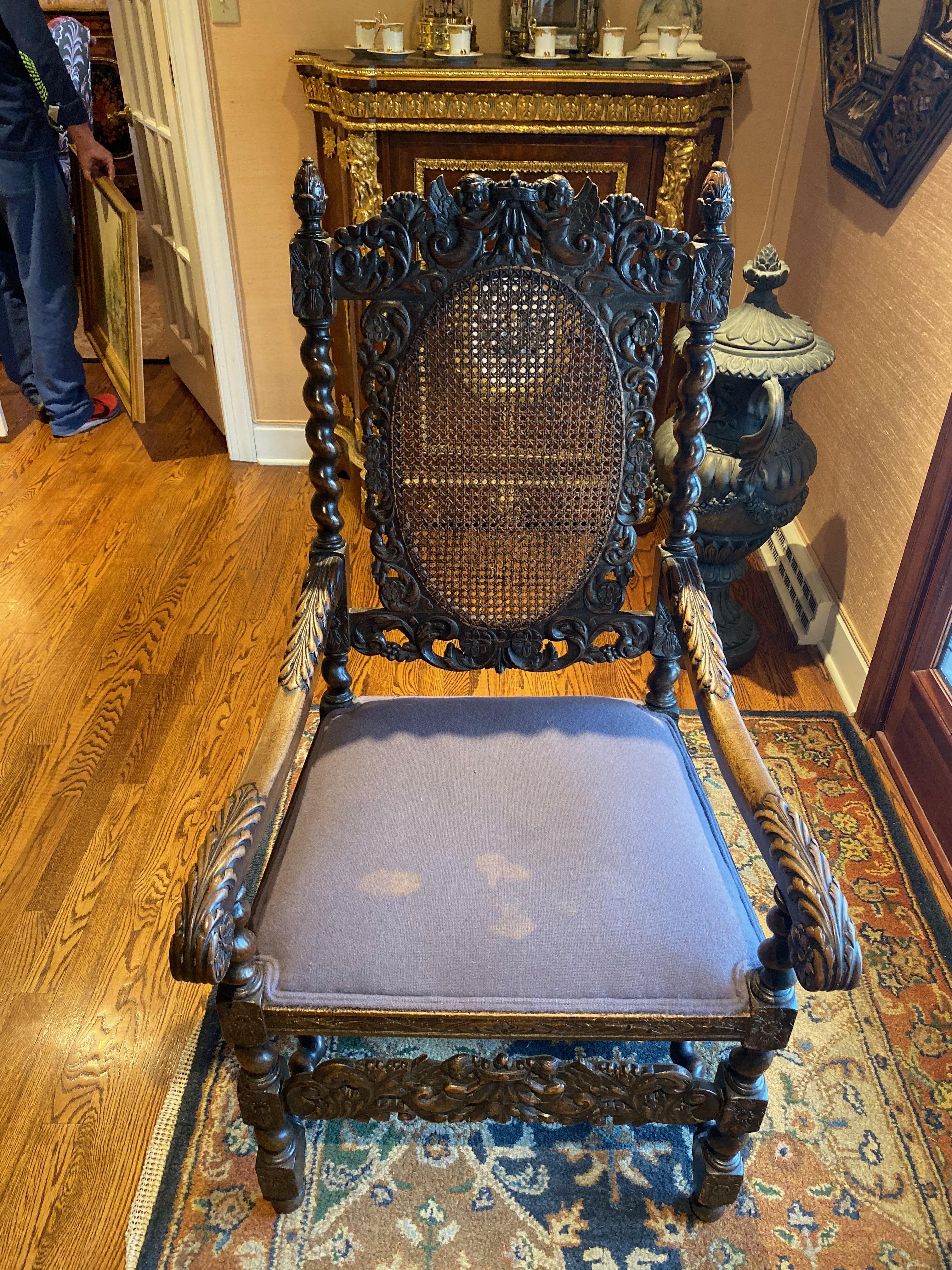 18th century French commerce antique carved wood chair. Excellent detailed wood carvings on armrests and backrests.