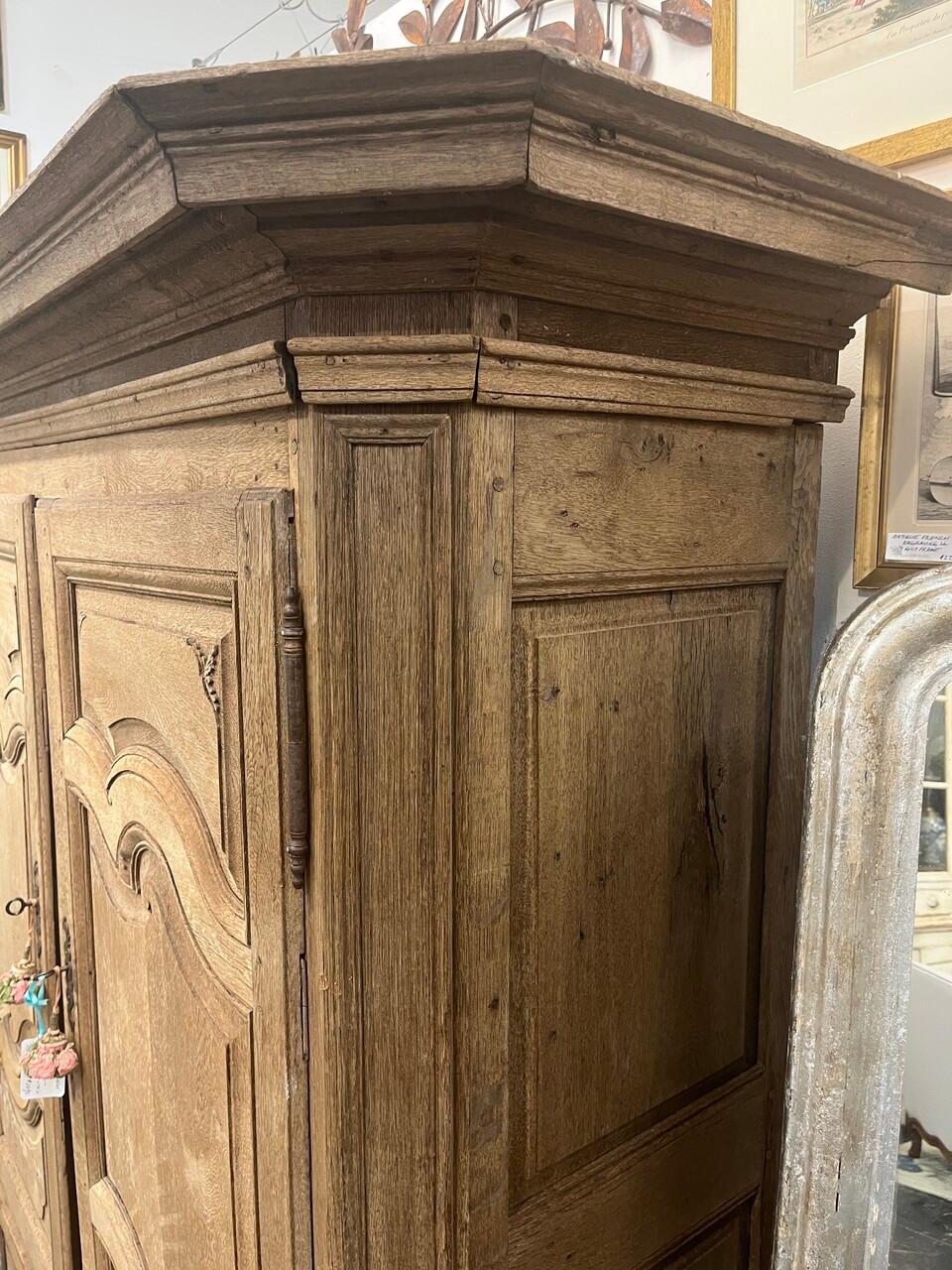 Hand-Carved 18th Century French Cupboard Armoire with Pegged Construction For Sale