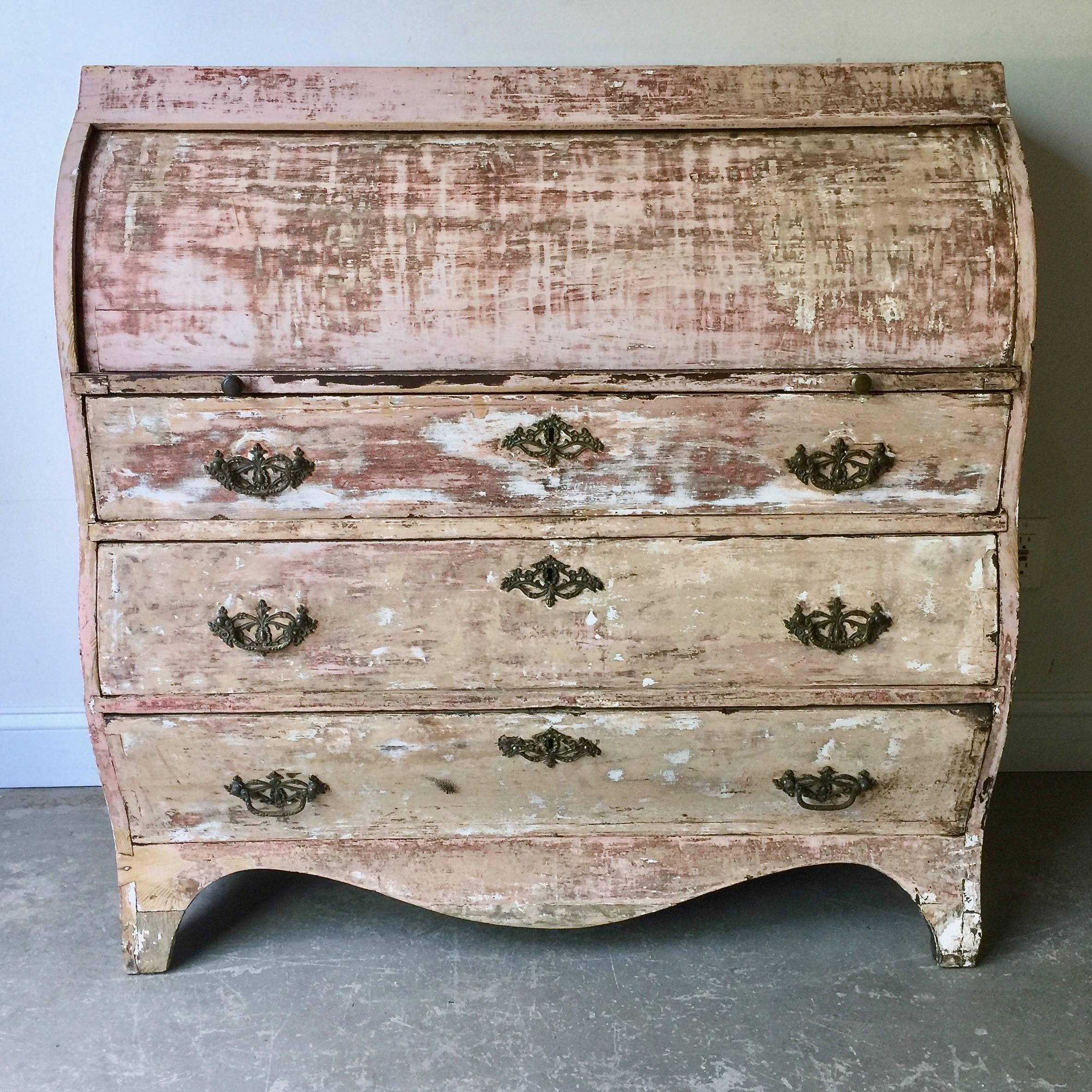 18th century Dutch Cylinder Bureau/Secretaire with roll top enclosing an interior fitted with many small drawers and cabby holes supported by three drawer base with original ornate bronze hardware’s and beautifully carved apron all in many