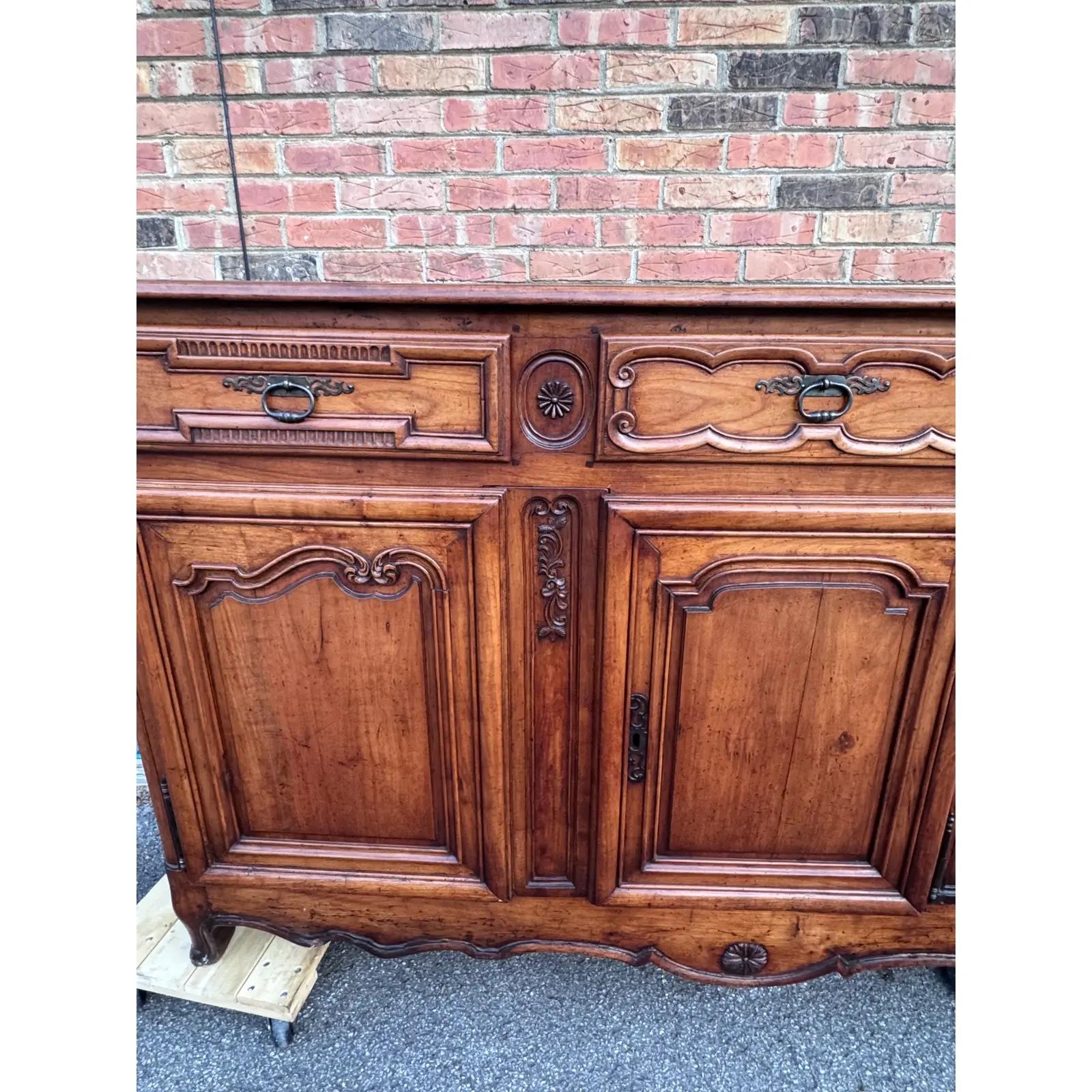 This enfilade is coming from 18th-century France to your living space today! Its beautiful patina shows its long history and resilience, but has recently been repolished to it looks newer and cleaner. All three drawers slide effortlessly, providing
