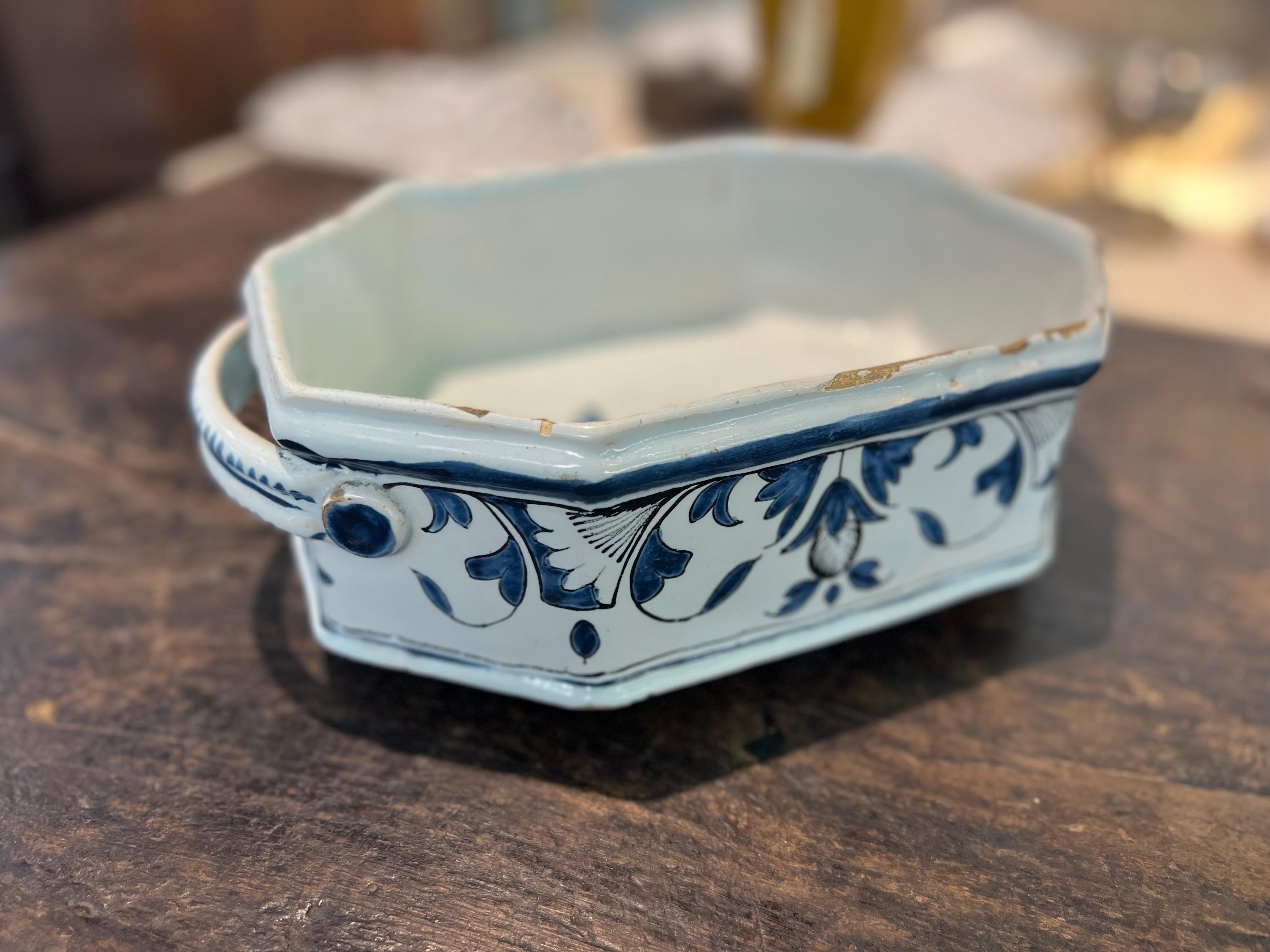 18th century French blue and white faience footed bowl with handles.