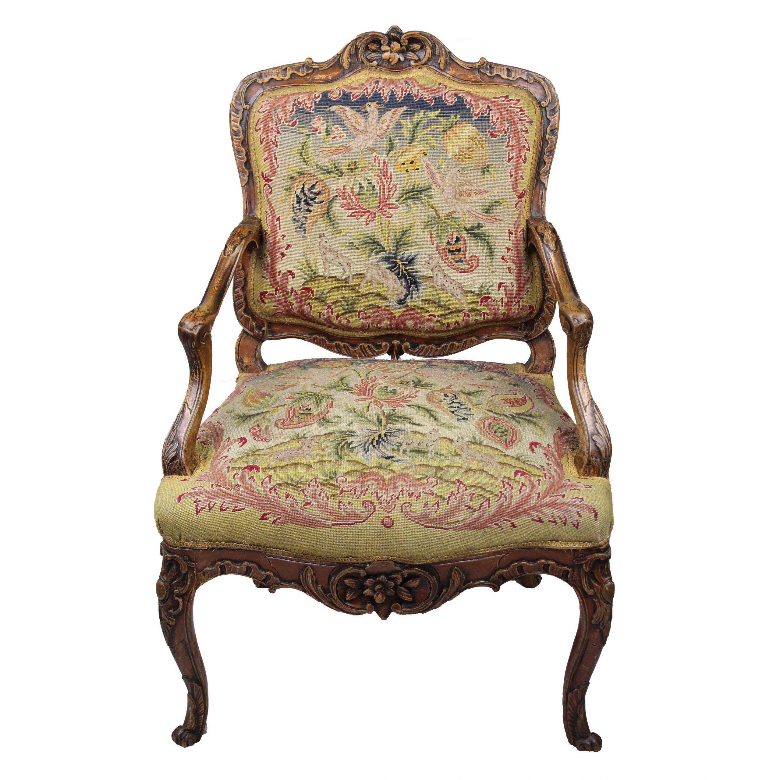 Armchair, so called Fauteuil à la Reine, rococo around 1750, walnut carved, foliage and rocaille motifs, cover with petit point embroidery, this from the 1st half of the 19th century, beautiful original patina,

height: 91,5 cm, width: 63 cm, depth: