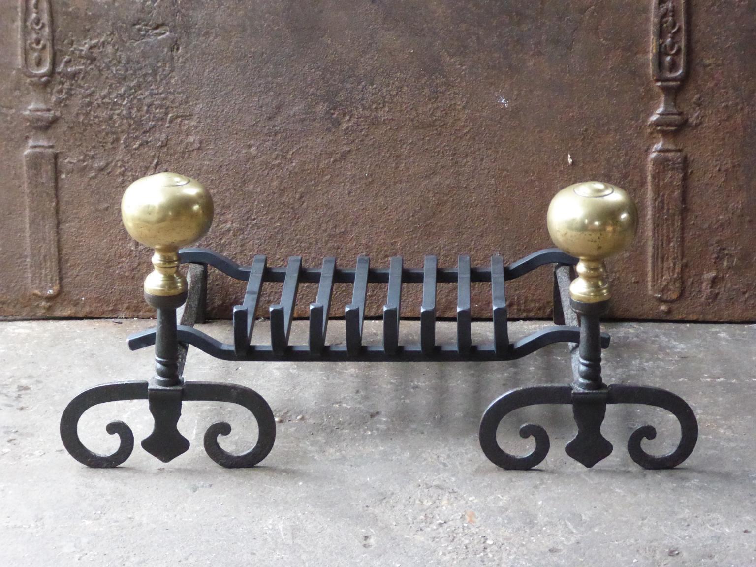 18th century French Louis XV fireplace basket, fire basket made of wrought iron and bronze. The basket is in a good condition and is fully functional. The total width of the front of the grate is 68.5 cm (27.0 inch).