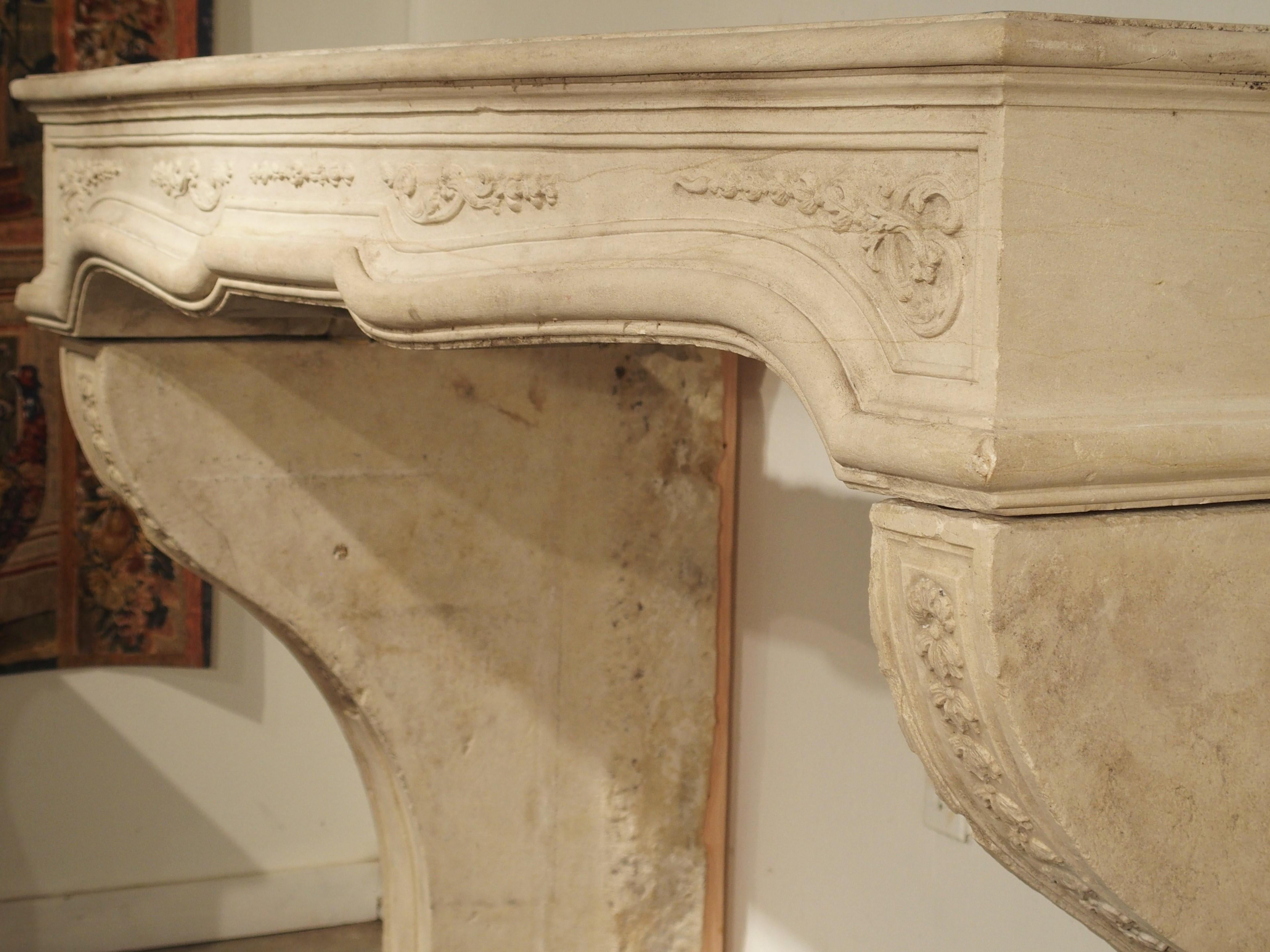 18th Century French Fireplace Mantel in Carved Limestone For Sale 11