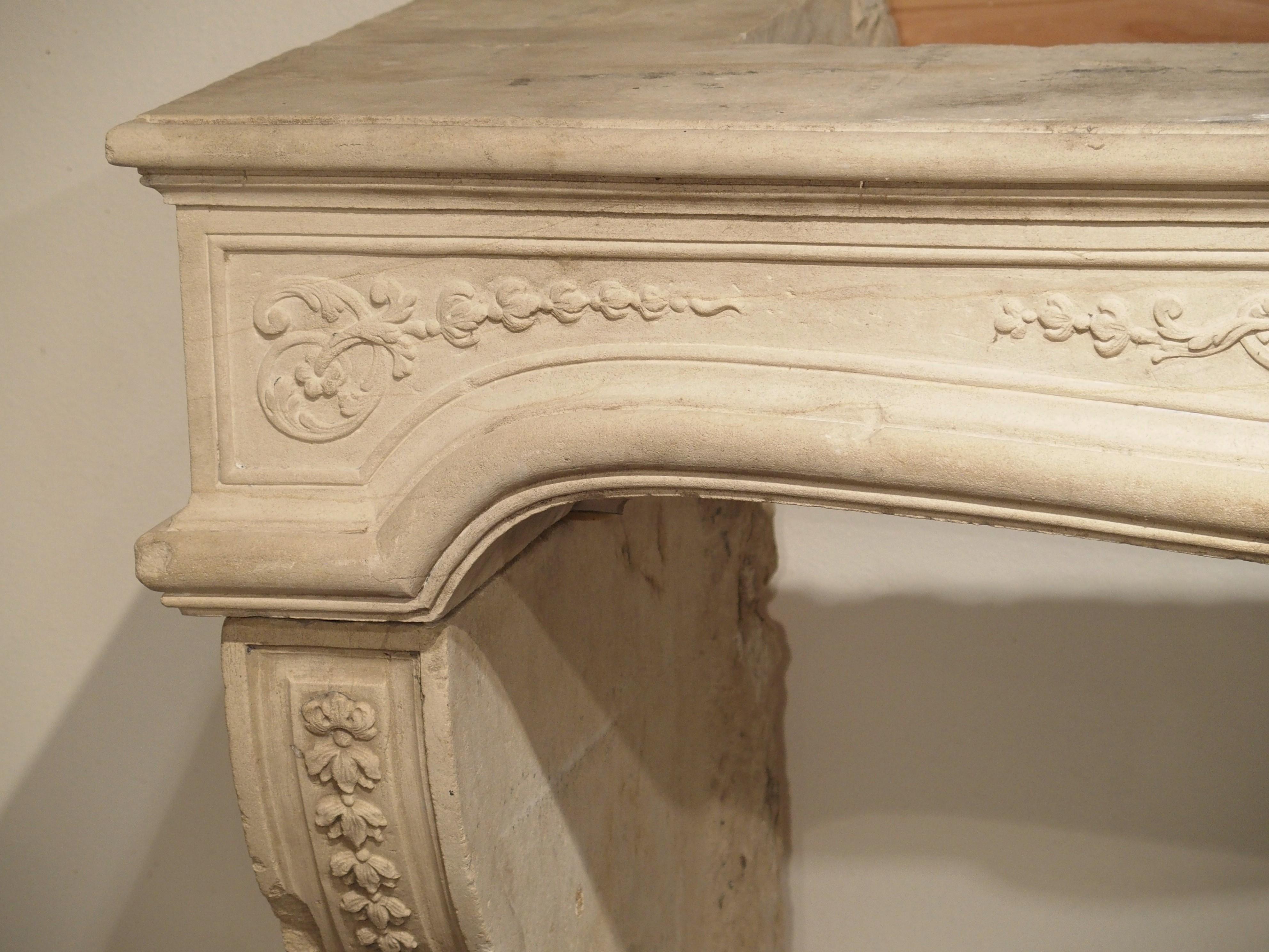 18th Century French Fireplace Mantel in Carved Limestone For Sale 14