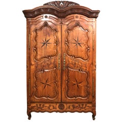 18th Century French Fruitwood Carved and Inlaid Armoire with Shelves