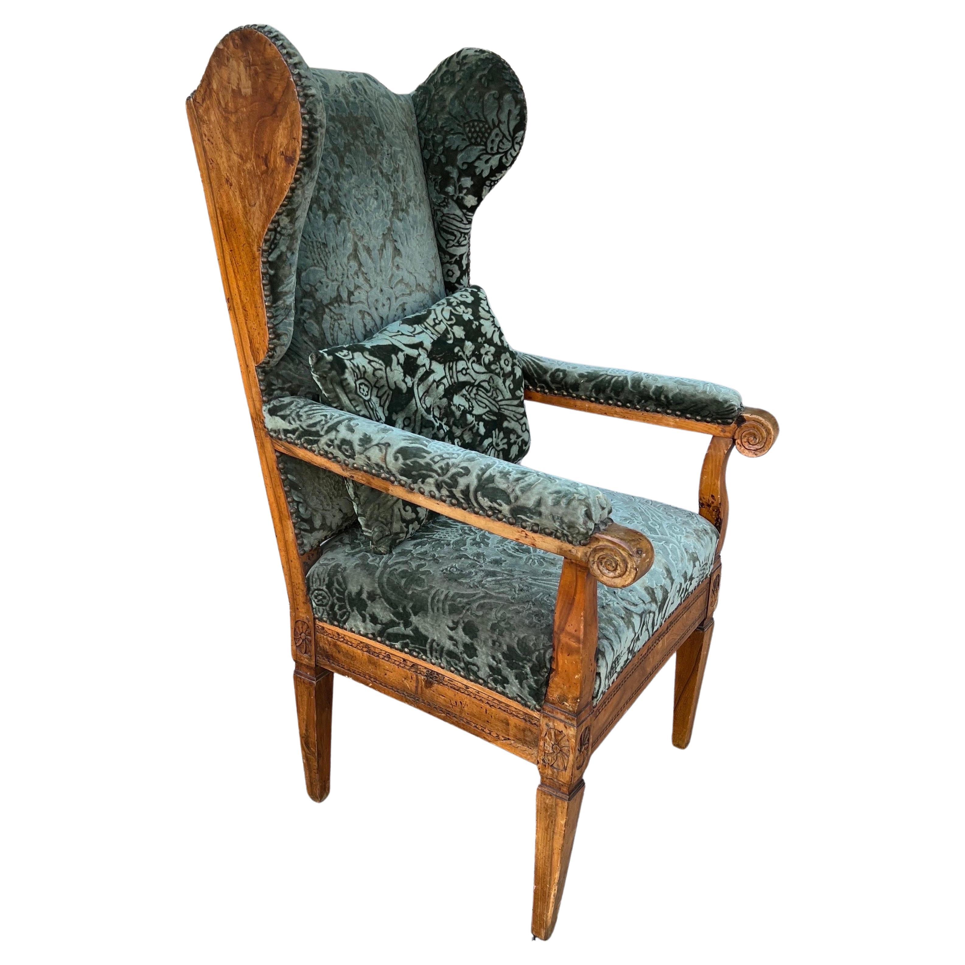 18th Century French Fruitwood Fauteuil À Oreills in Fortuny For Sale