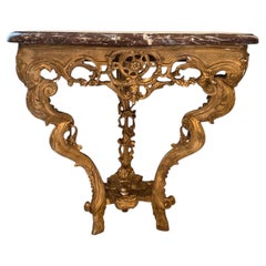 Console francese del XVIII secolo con piano in marmo e piedini a zoccolo