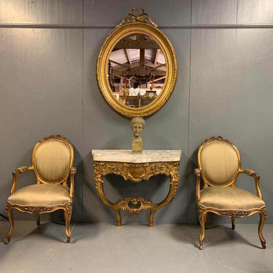 Very decorative 18th century French gilt wall-mounted console table with marble top.
Fantastic detail and beautifully carved frame and standing on hoof feet.
The console table needs to be fitted to the wall securely and is done so through the back
