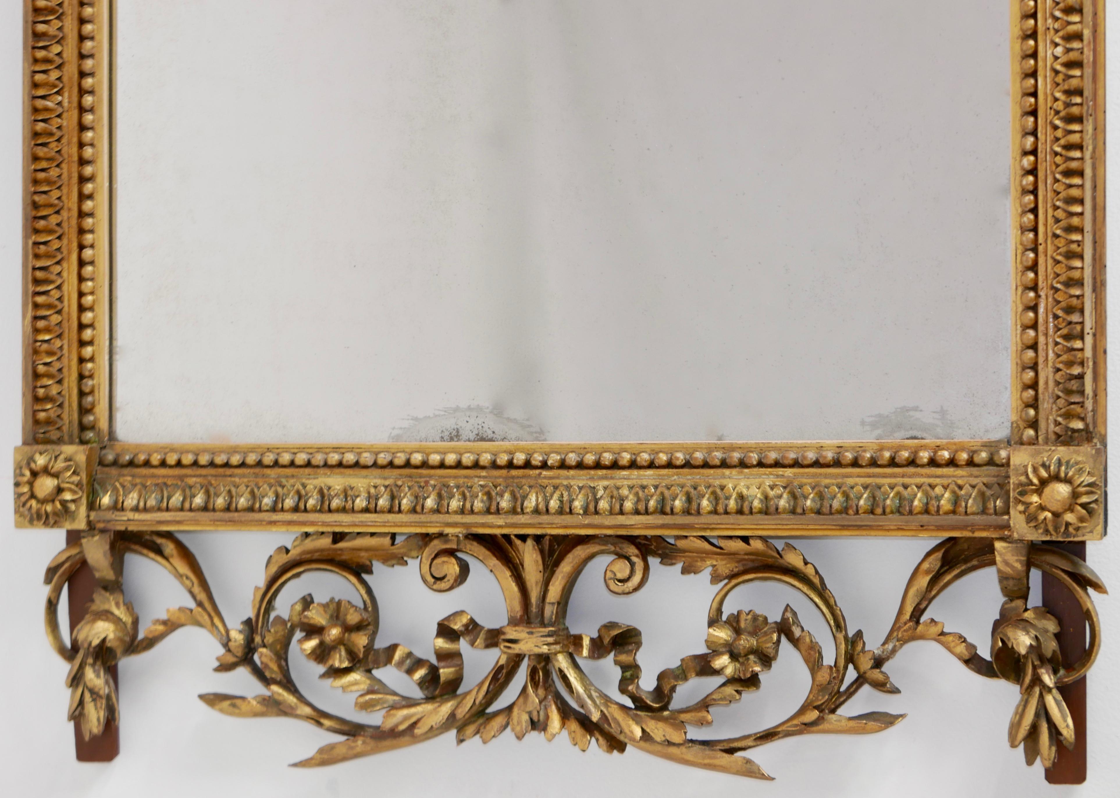 Glass 18th Century French Giltwood and Églomisé Pier Mirror For Sale