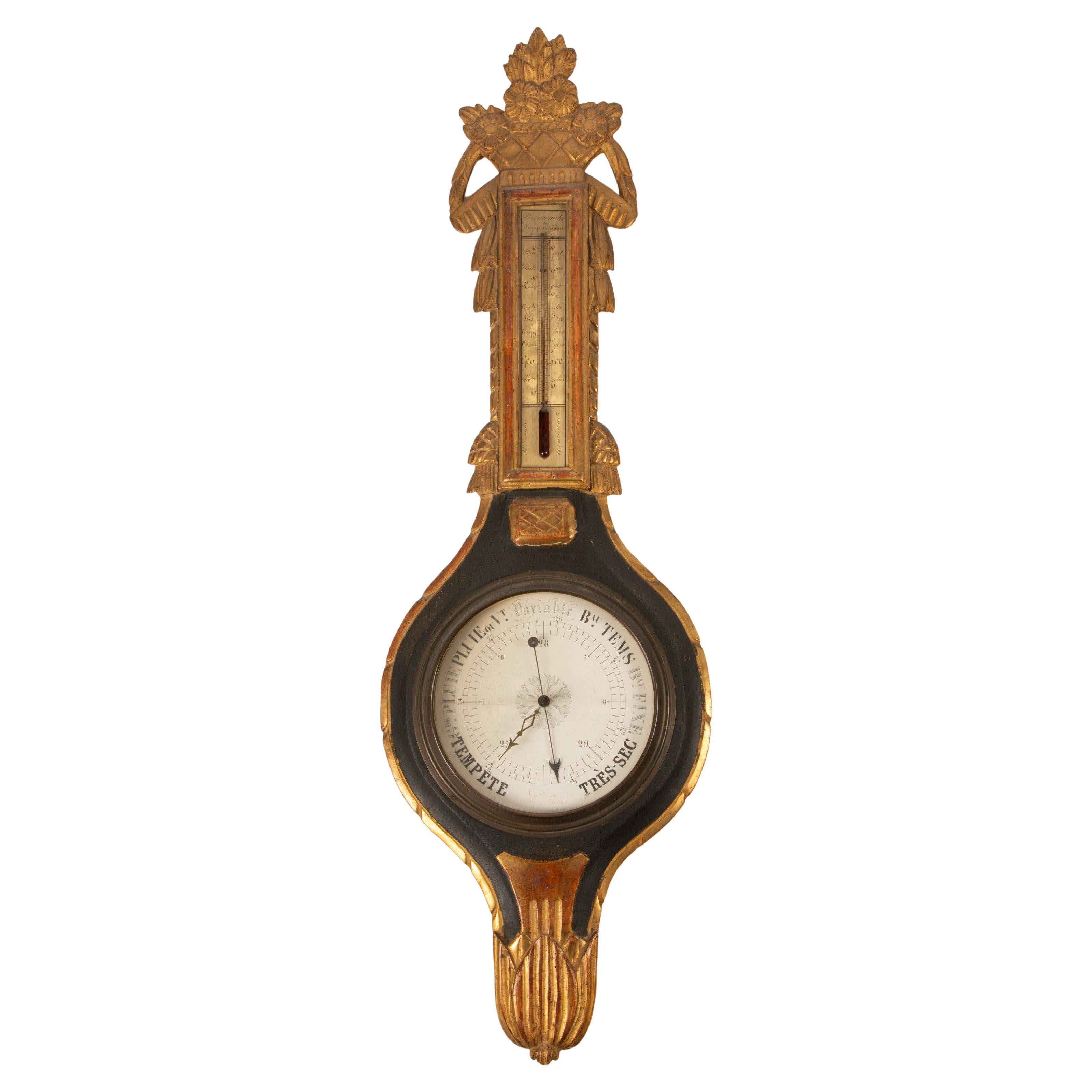 18th Century French Giltwood and Ebonized Barometer with Floral Crest