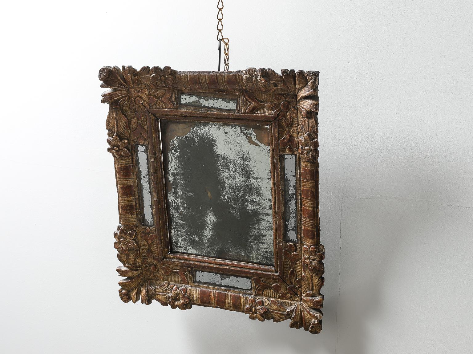 18th century French giltwood mirror with original mercury glass plate.

 