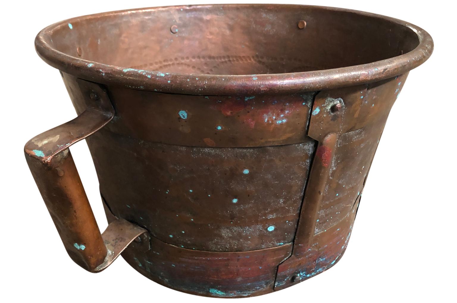 A beautiful 18th century French copper grain measure. A perfect kitchen accent piece or wonderful as a planter.