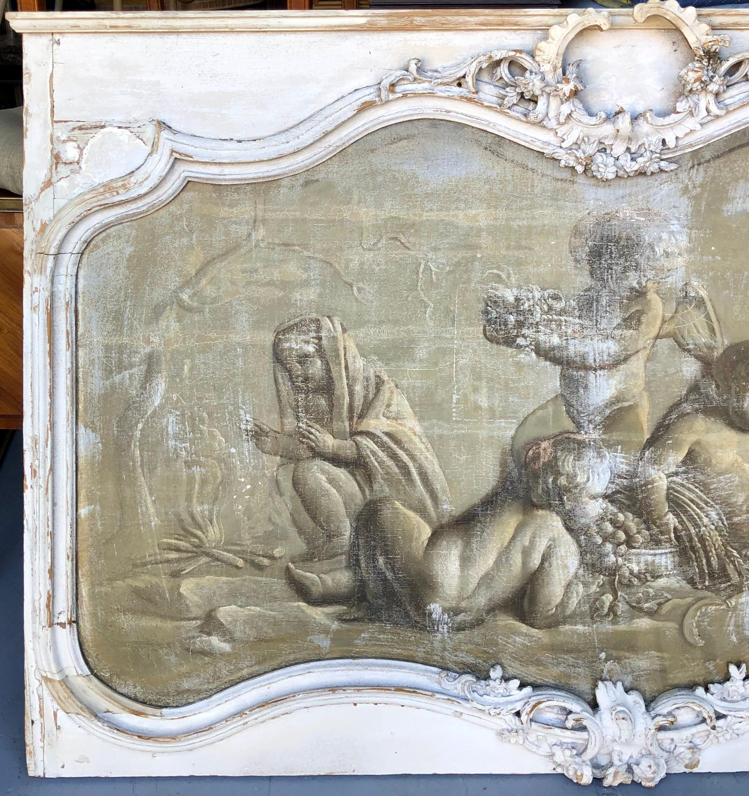 Hand-painted in France, this handsome grisaille overdoor painting is from the 18th Century. Grisaille is a monochromatic painting method that relies on using gray or other neutral colors to invoke qualities of a sculpture or drawing.
This painting