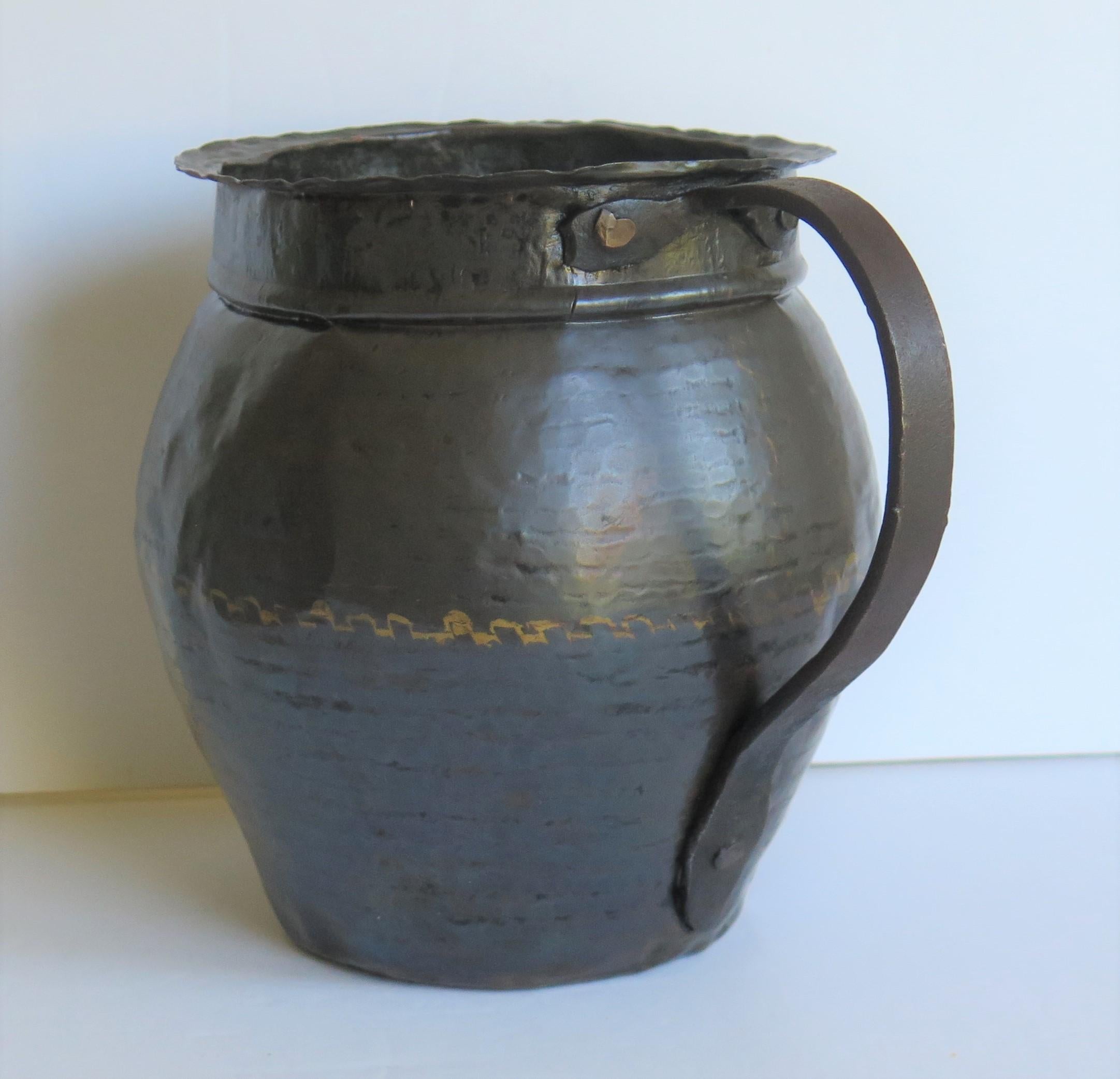 antique copper water pitcher