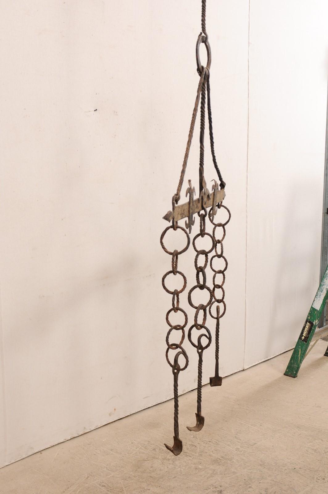 Medieval 18th Century French Hanging Iron Fireplace Accessory For Sale