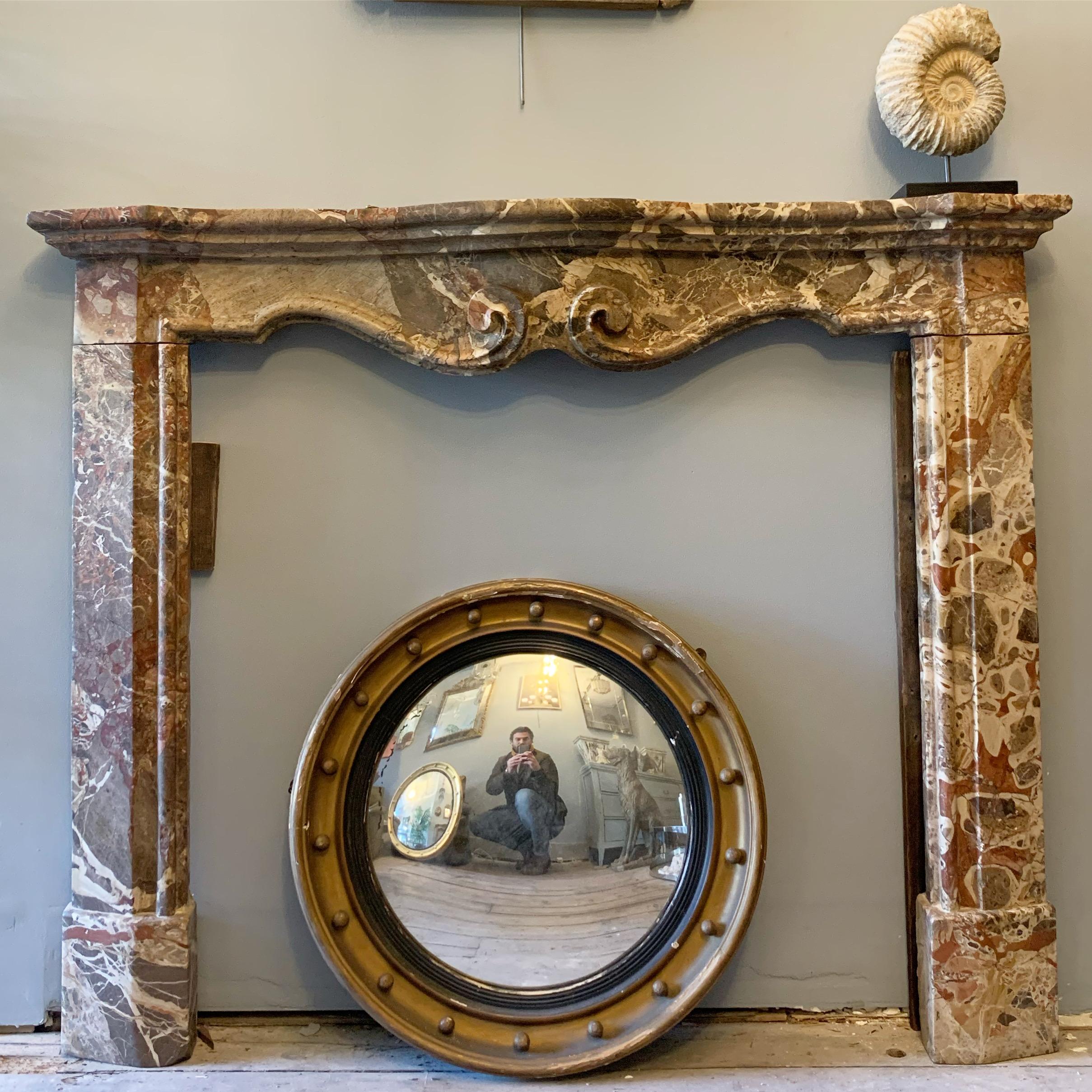 18th century French Chimneypiece in carved Jasper marble, the simple carving allows it to work very well in period or modern designed interiors.

Opening dimensions: 101cm W x 102cm H.
   