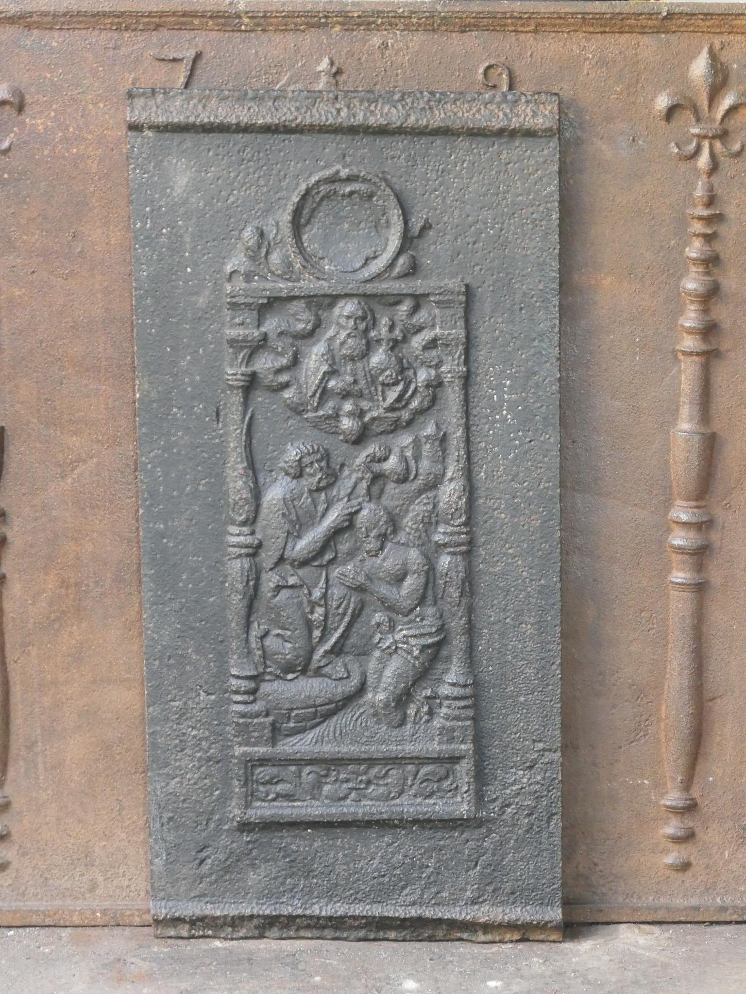 French Louis XV period fireplace fireback with John the Baptist. 

The fireback is made of cast iron and has a natural brown patina. Upon request it can be made black / pewter. The fireback is in a good condition and does not have cracks.

 