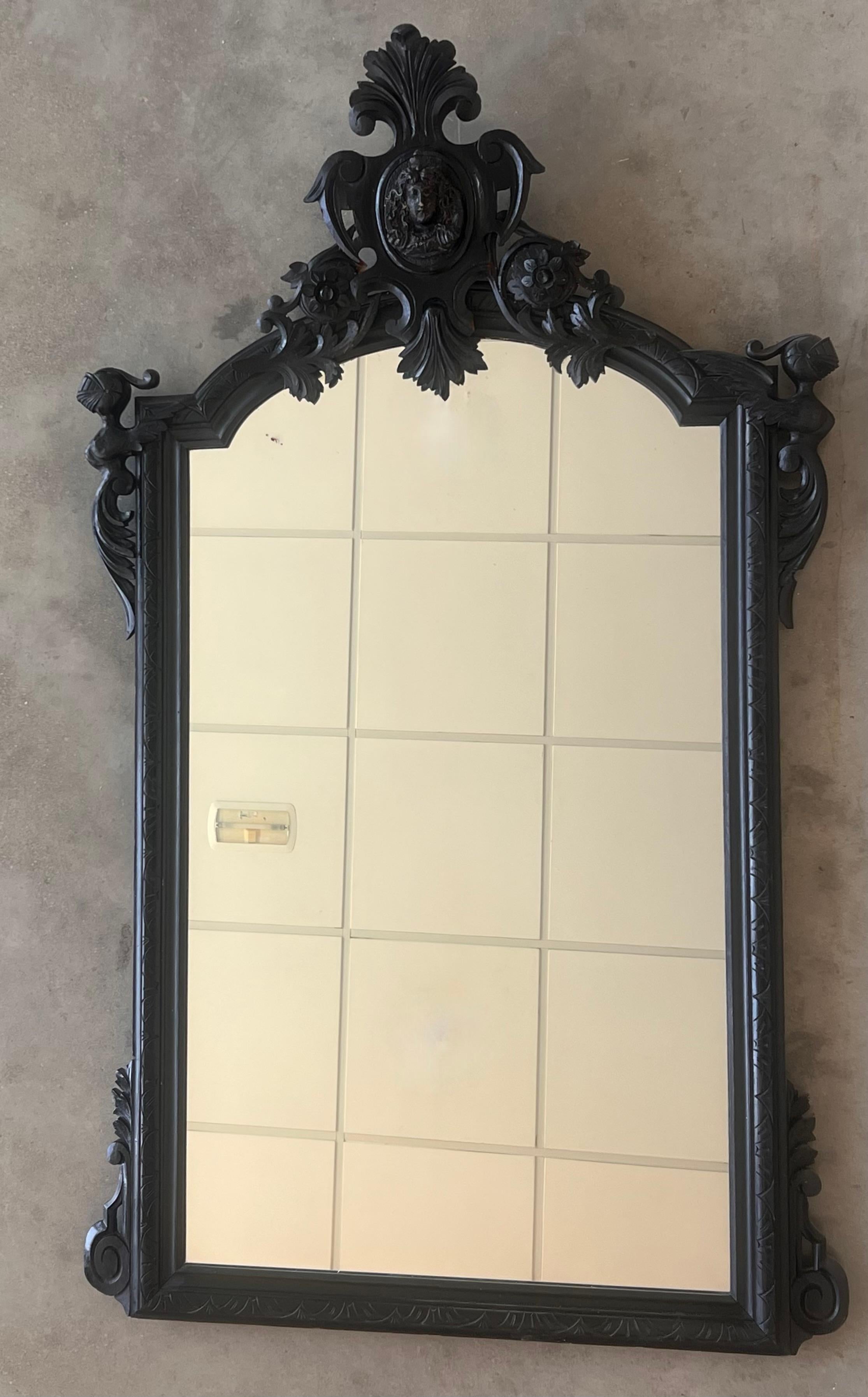 18th century large Flemish baroque walnut ebonized mirror
Very decorative impressively carved mirror in the typical Flemish manner.
 