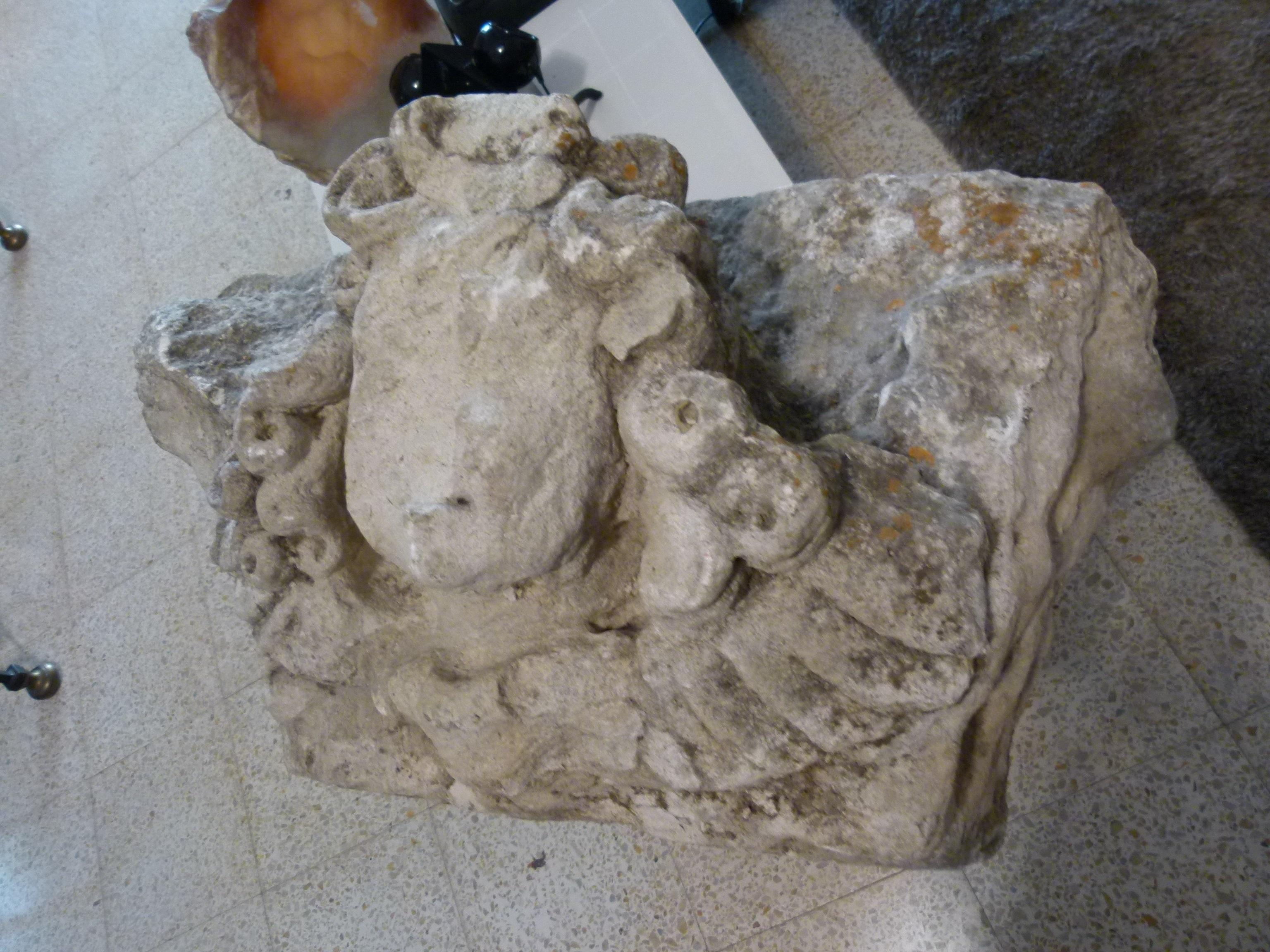 Hand-Carved French Limestone Capital representing the head of a woman