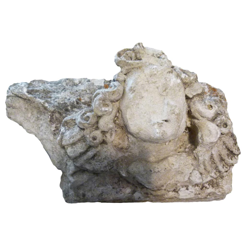 French Limestone Capital representing the head of a woman
