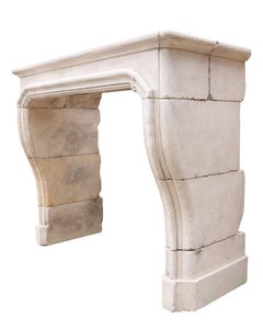 18th Century French Limestone Chimneypiece with Curved Jambs