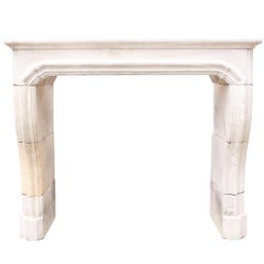 18th Century French Limestone Chimneypiece with Curved Jambs