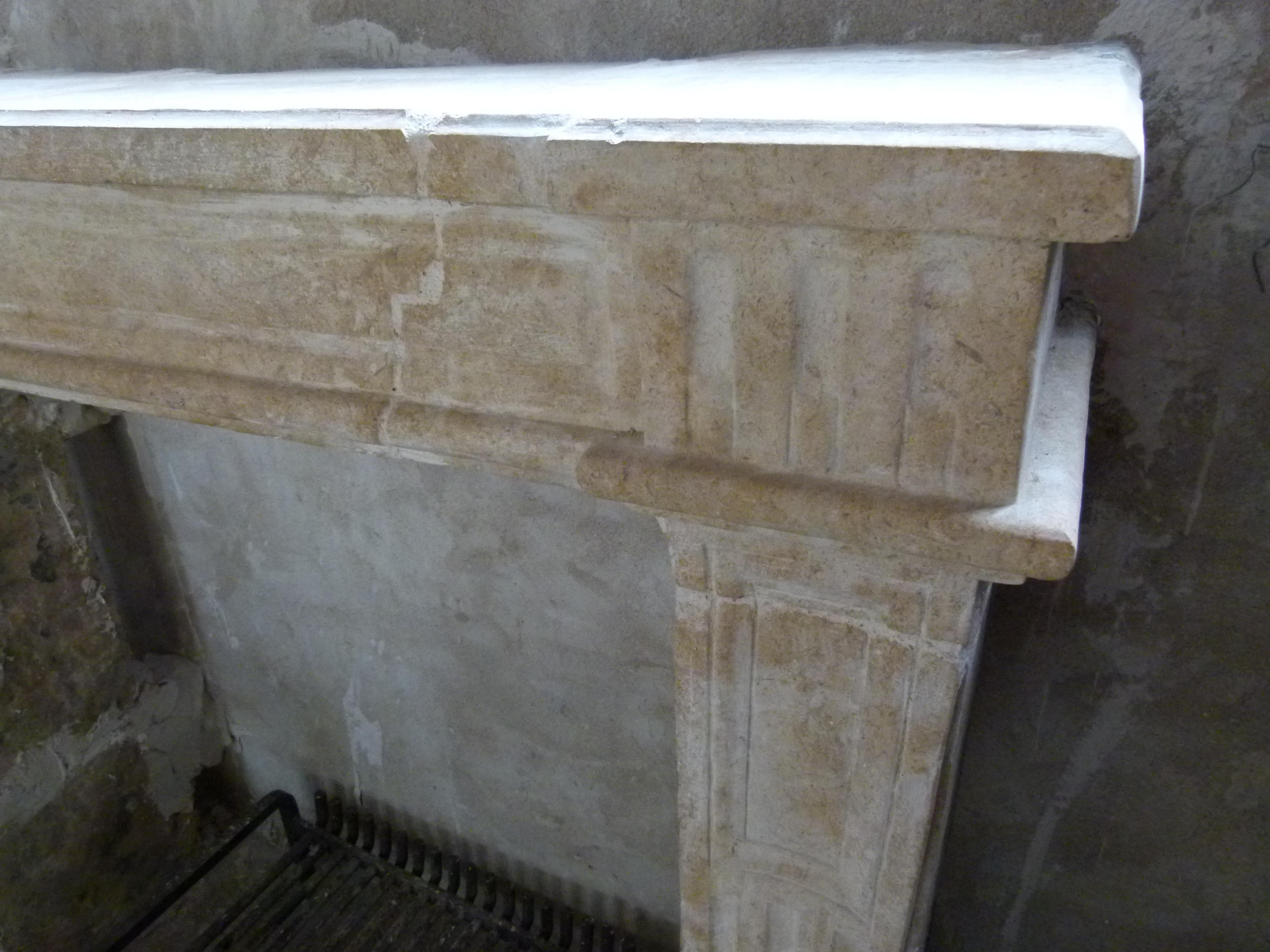 Carved 18th Century French Limestone Fireplace Mantel