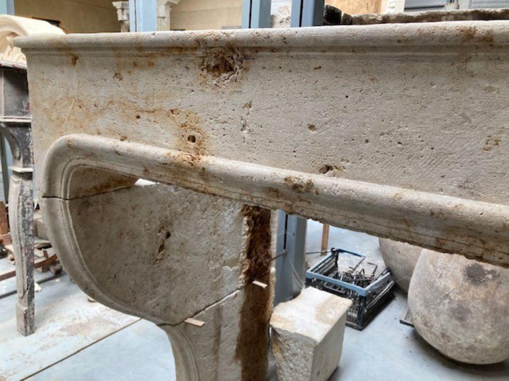 18th Century and Earlier 18th Century French Limestone Fireplace Mantel For Sale