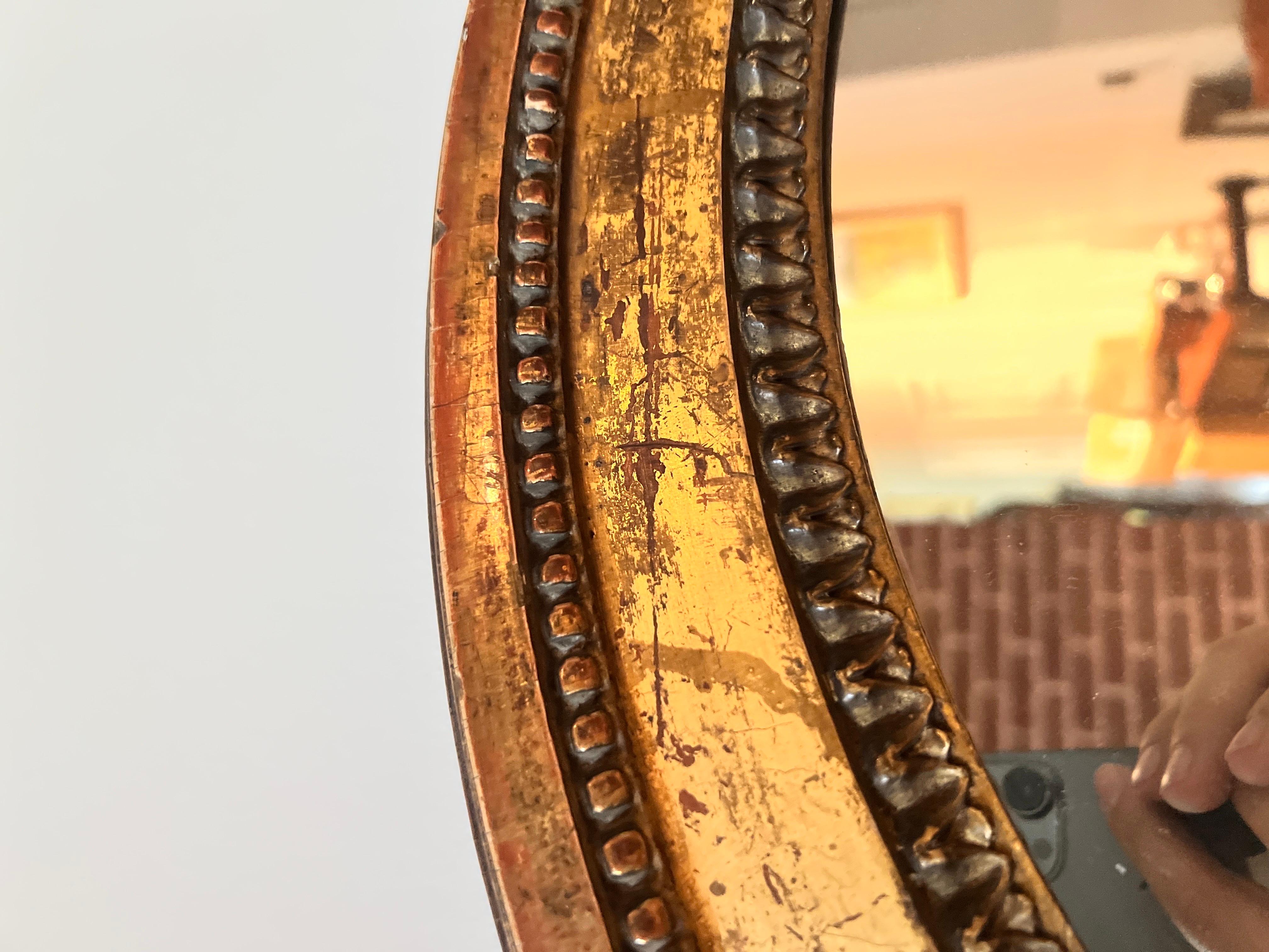 18th Century, French Louis Philippe Carved Bellflower Giltwood Wall Mirror In Good Condition For Sale In Atlanta, GA