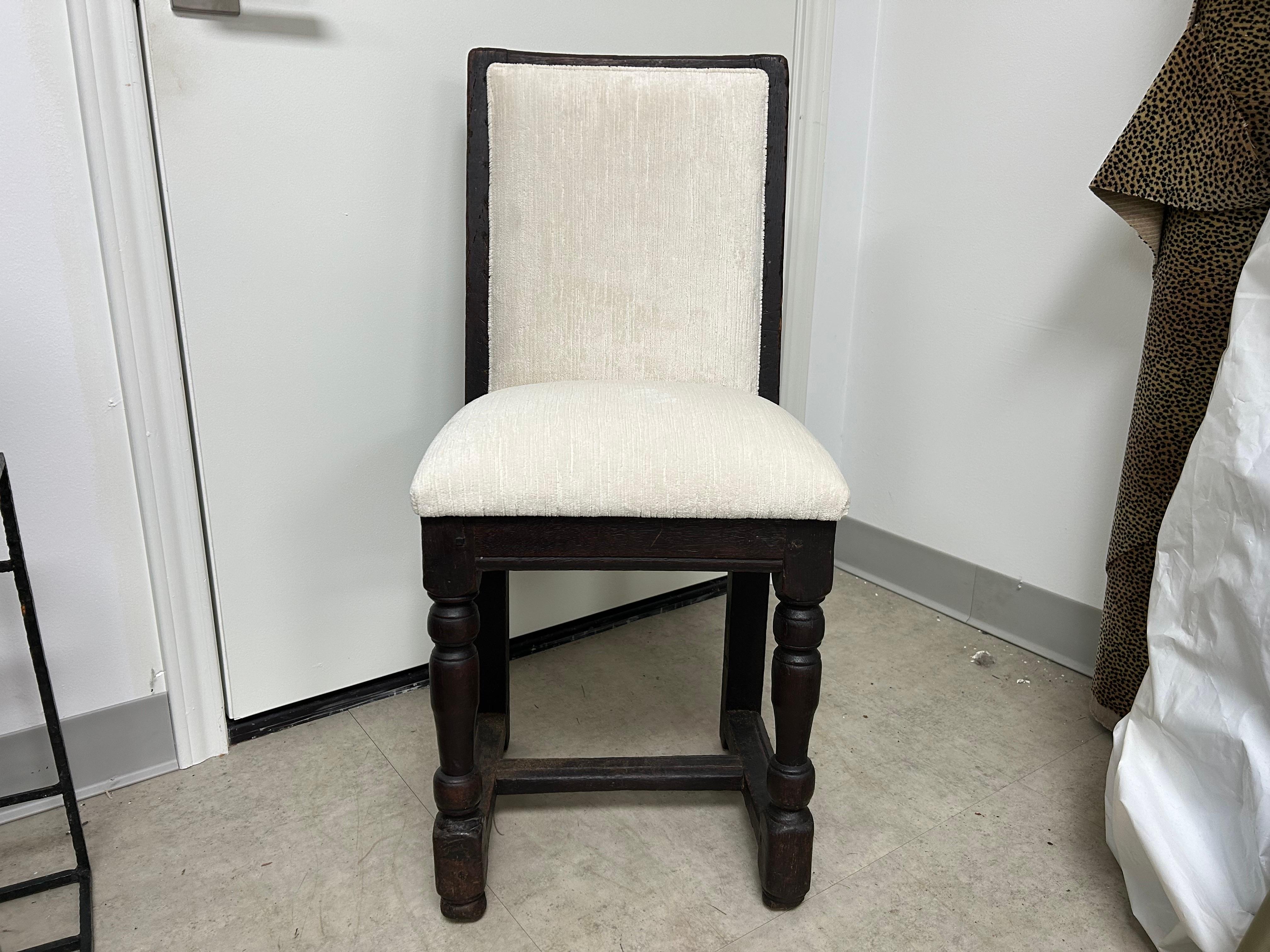 18th Century French Louis XIII Style Children's Chair.
This lovely antique French Louis XIII style child's chair is the perfect accent chair for intneded use or displaying a stack of books or as an interesting design element or accessory!