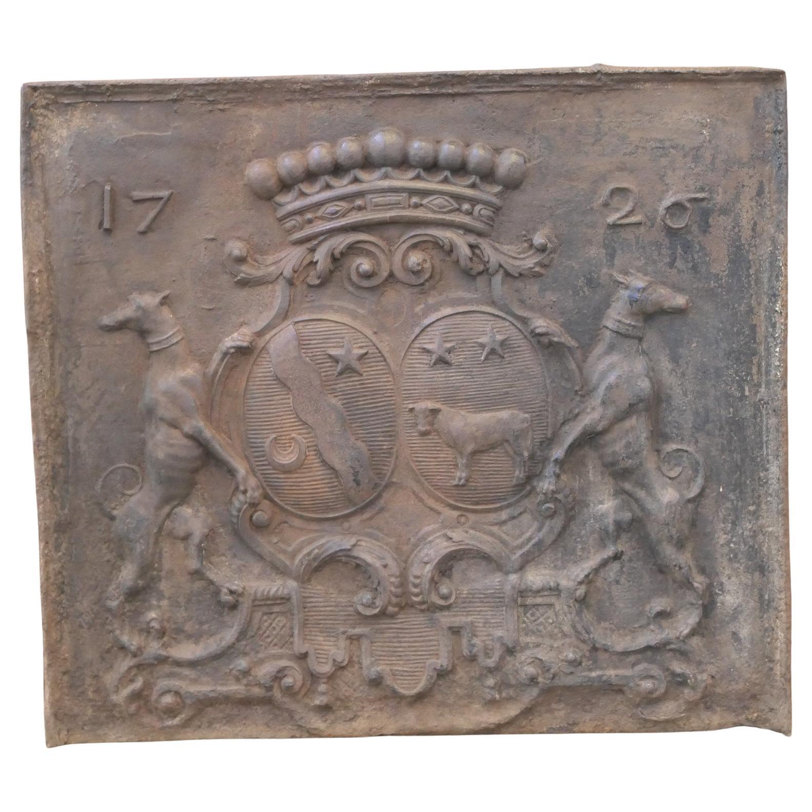 Plaque de cheminée / dosseret "armoiries" Louis XIV du XVIIIe siècle