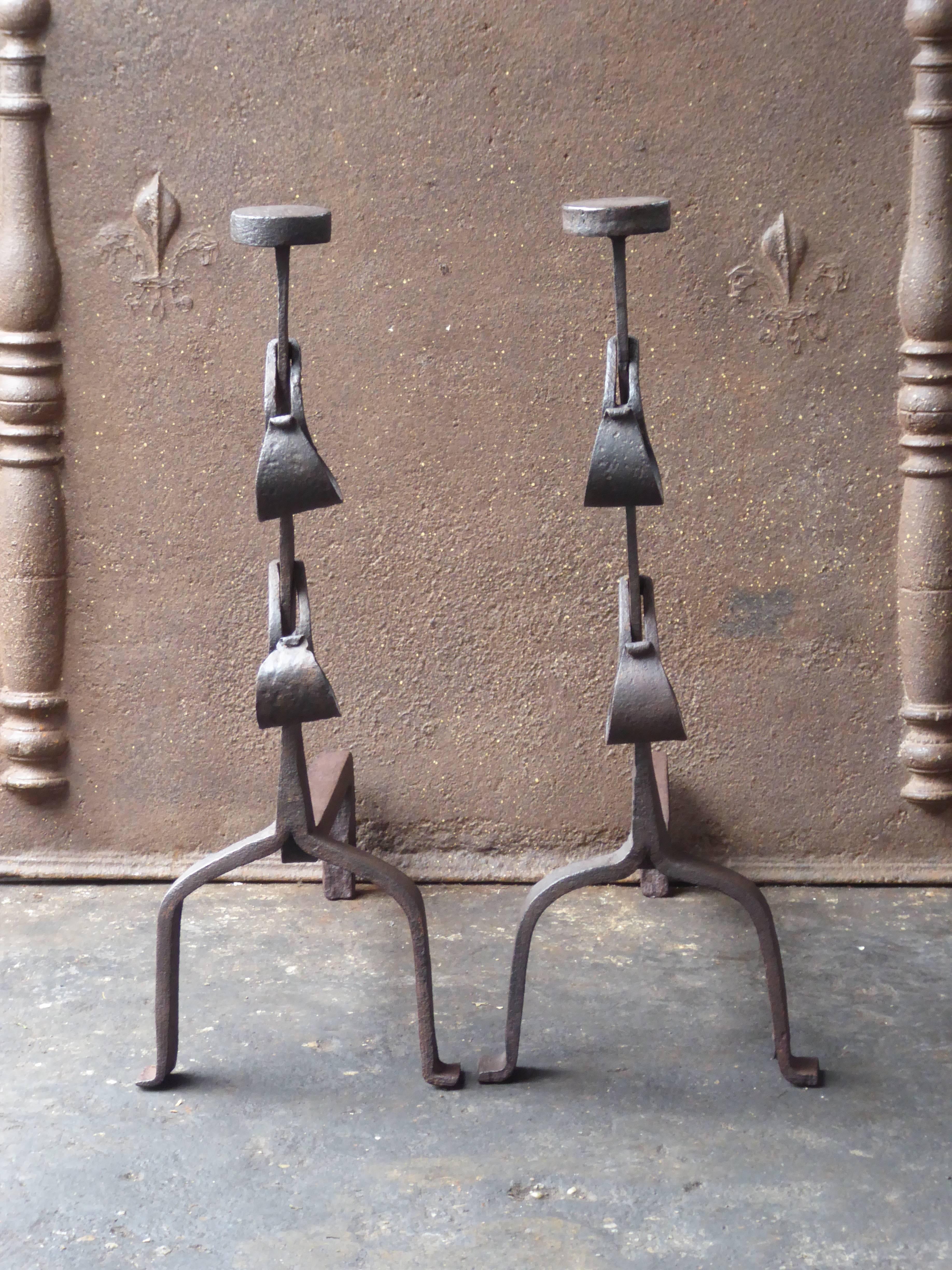 18th century French Louis XV andirons made of wrought iron. The condition is good.

