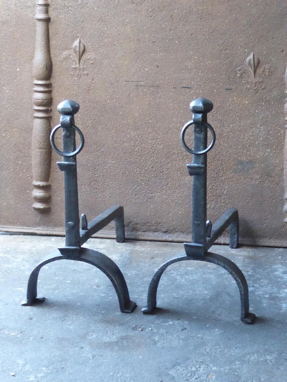 Beautifully made 18th century French Louis XV andirons. The andirons are made of wrought iron. The andirons have spit hooks to grill food.







 
