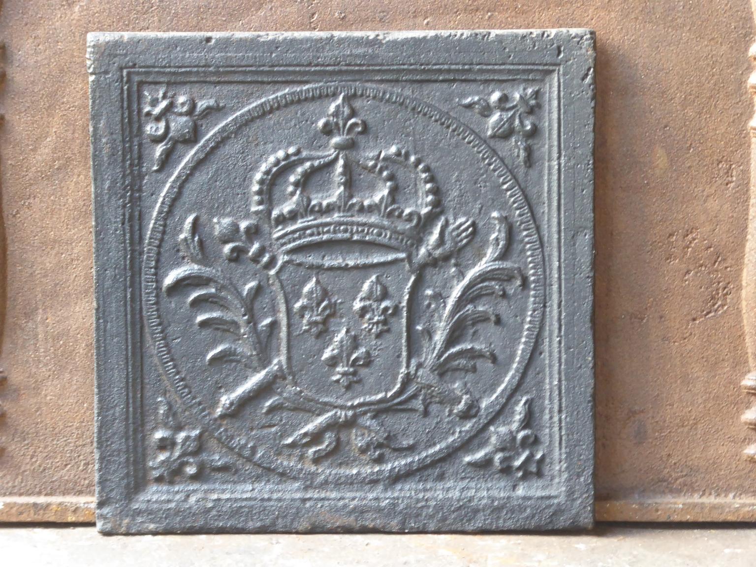18th century French Louis XV fireback with the Arms of France. This is the coat of arms of the House of Bourbon, an originally French royal house that became a major dynasty in Europe. It delivered kings for Spain (Navarra), France, both Sicilies