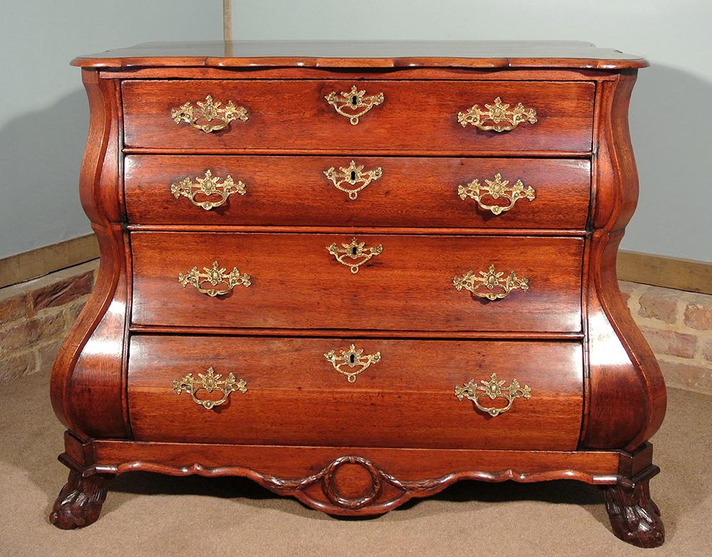 A lovely original 18th century bombe commode made from cherry with a fabulous color.

This elegant chest of drawers was made in France by a skilled cabinet maker in circa 1780.

This will light up any room and is stunningly attractive yet a