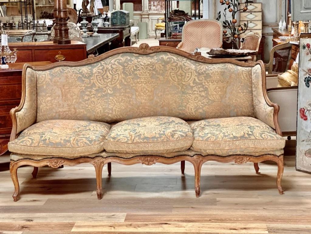 Fine 18th Century French Louis XV Canape settee with Fortuny upholstery.  

