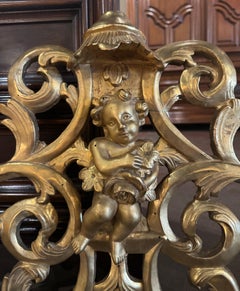 18th Century French Louis XV Carved and Pierced Giltwood Wall Decor with Cherub